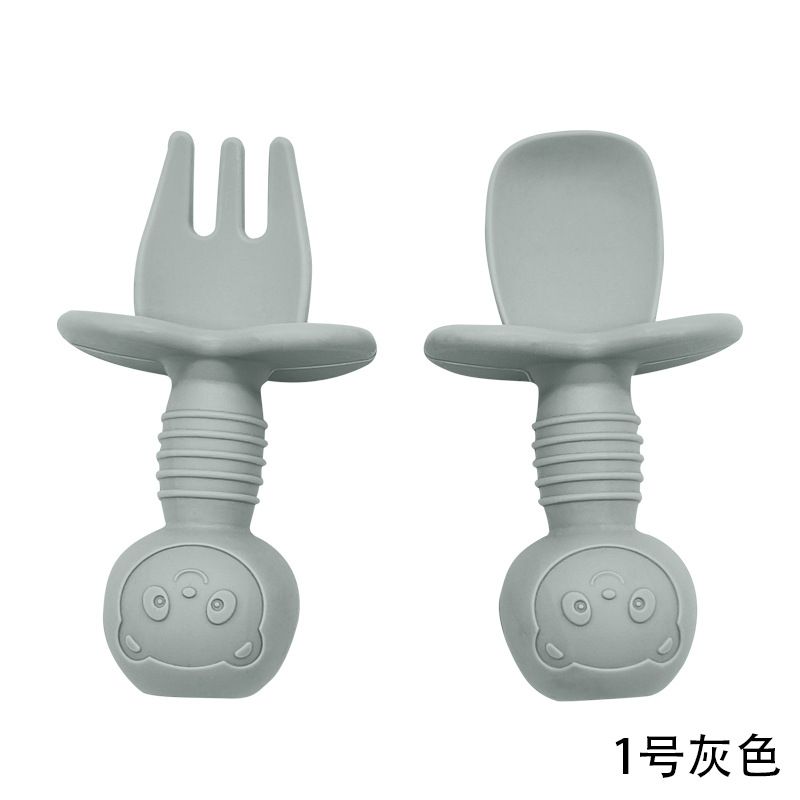 Safety anti choke barrier shield on soft silicone baby training spoon