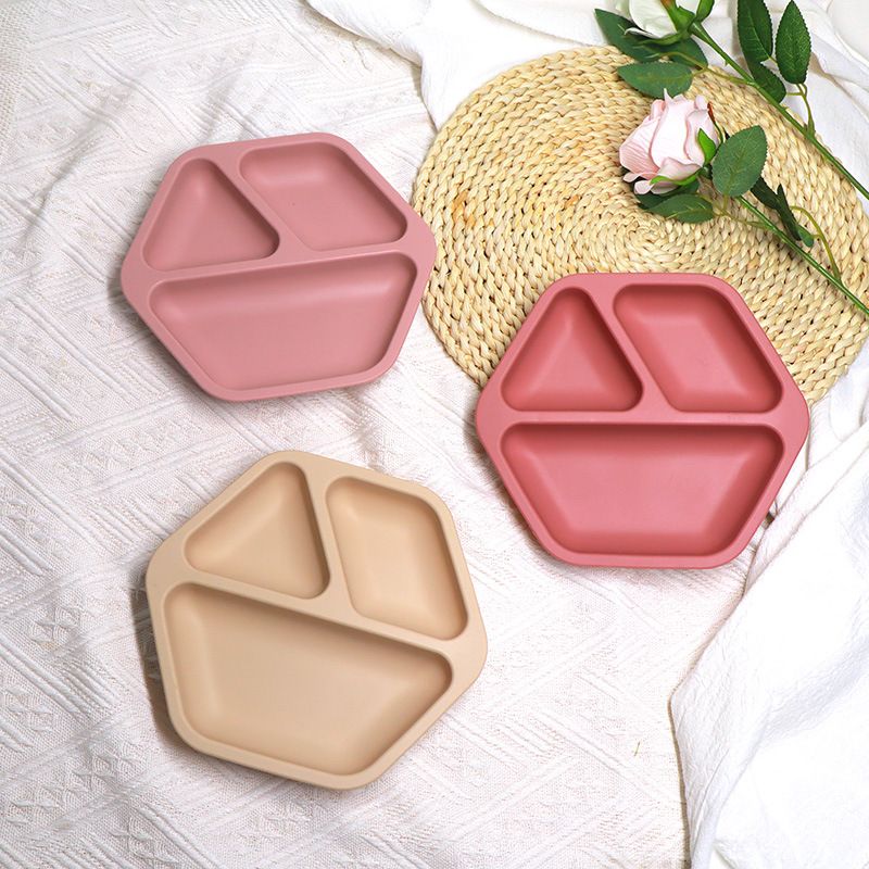 Deep sections on geometric silicone meal plate for easy toddler scooping
