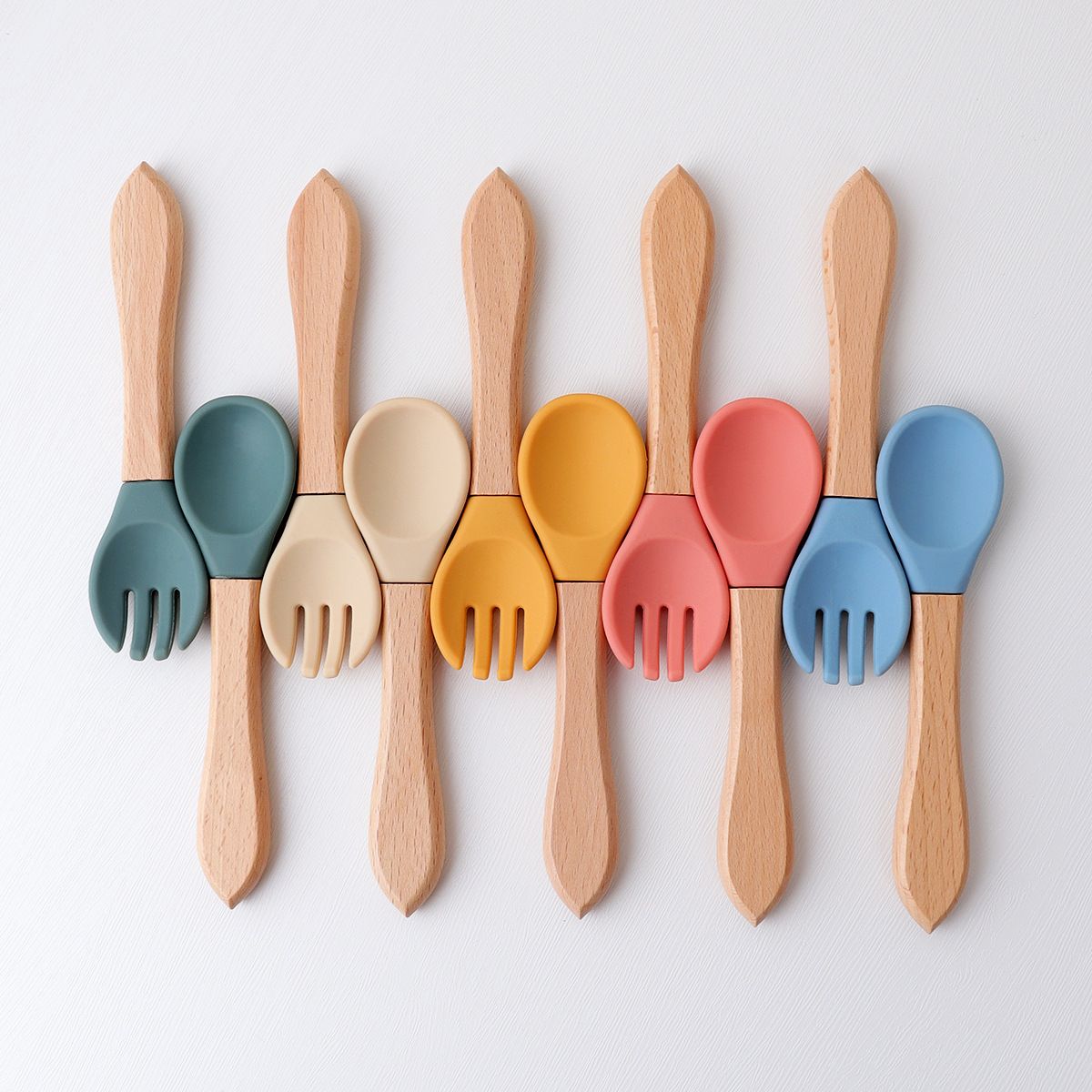 Ergonomic natural wood handle baby feeding spoon for easy toddler grip