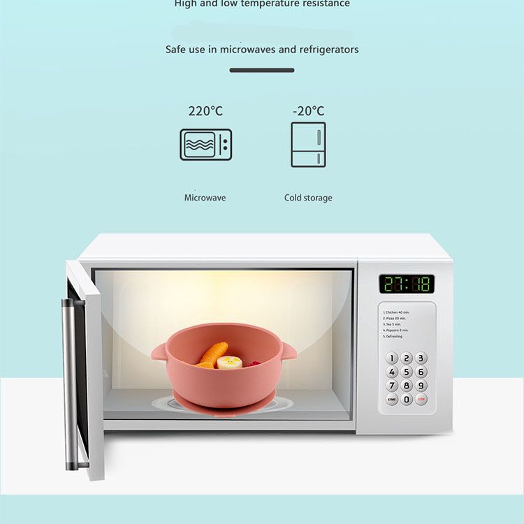 Anti-toss vacuum suction bottom on spill-proof infant feeding dish