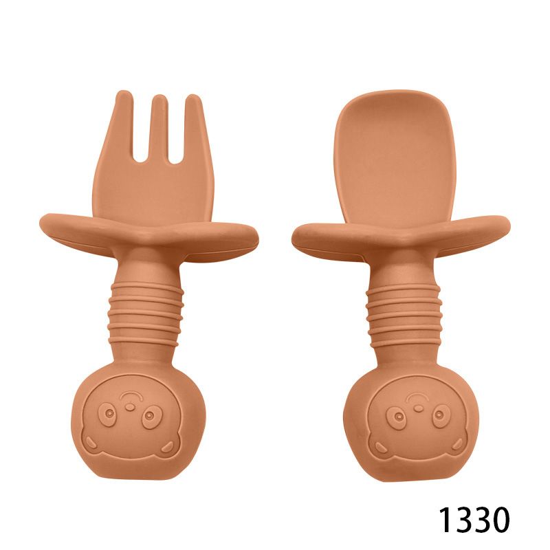 Ribbed short ergonomic handle for toddler self feeding utensils