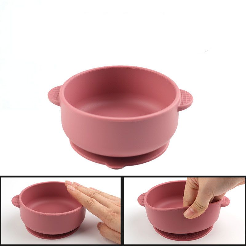 Strong non-slip suction base with quick release tab on baby bowl