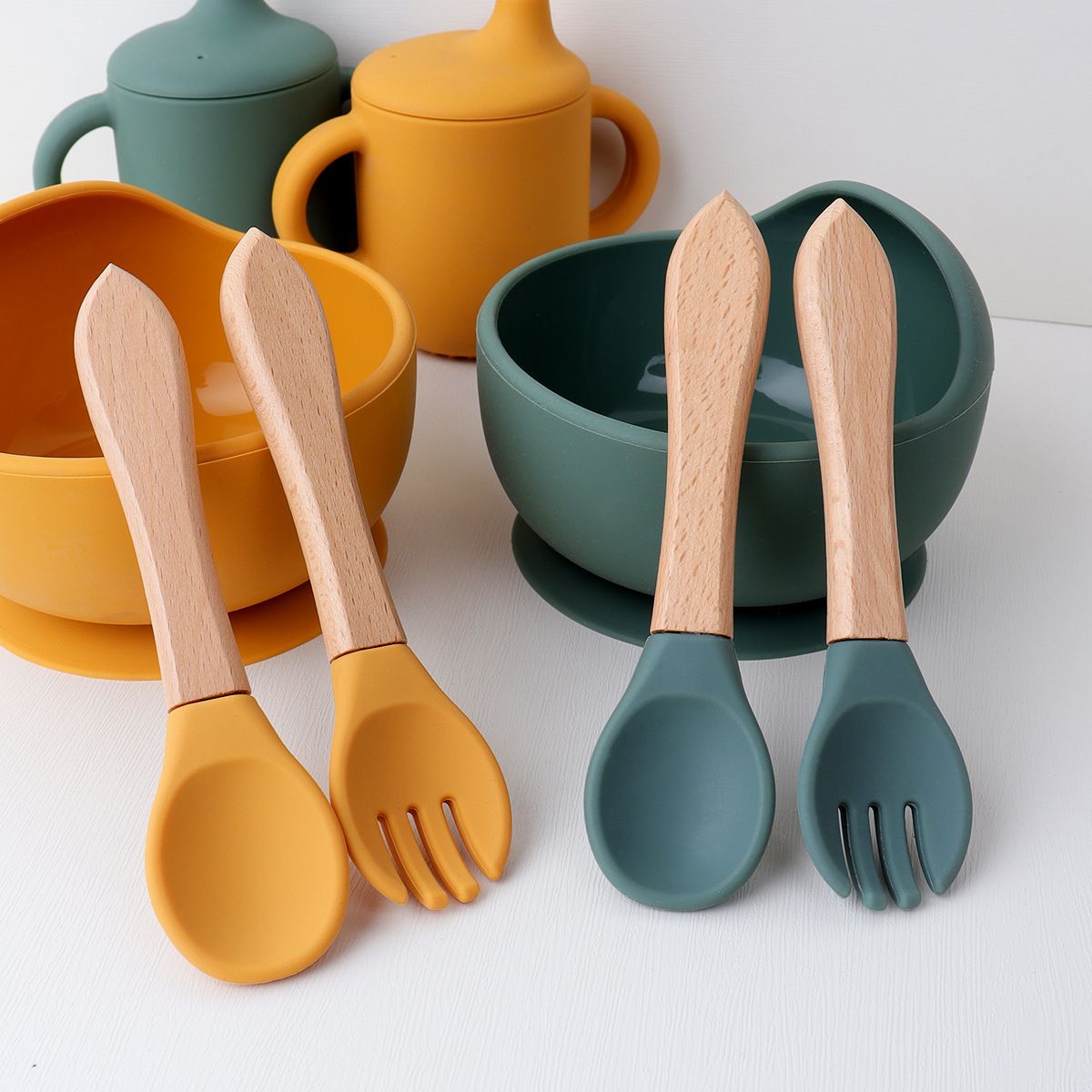 Wholesale eco-friendly wooden handle silicone baby spoons in custom muted colors