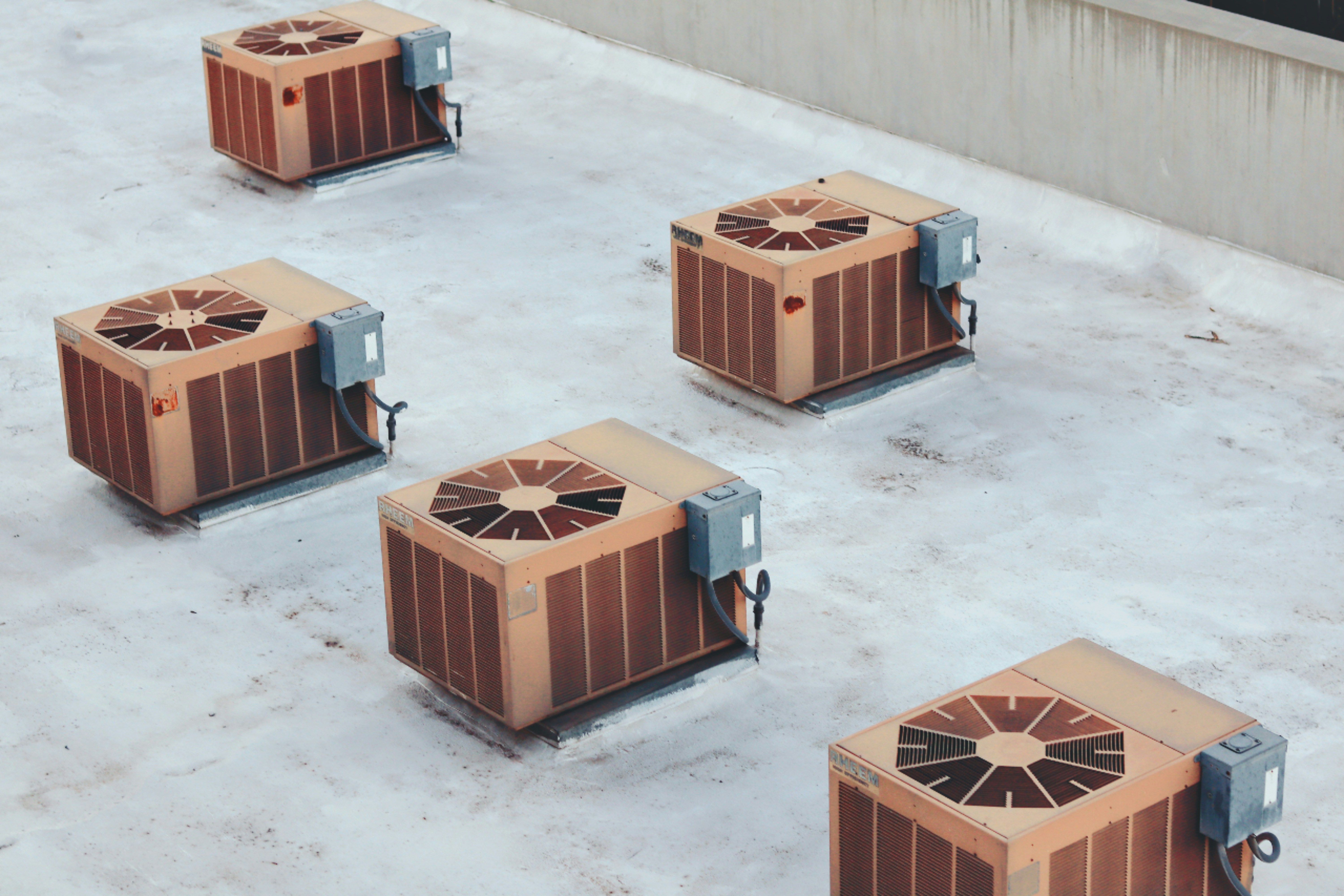 Home HVAC condenser units on a rooftop