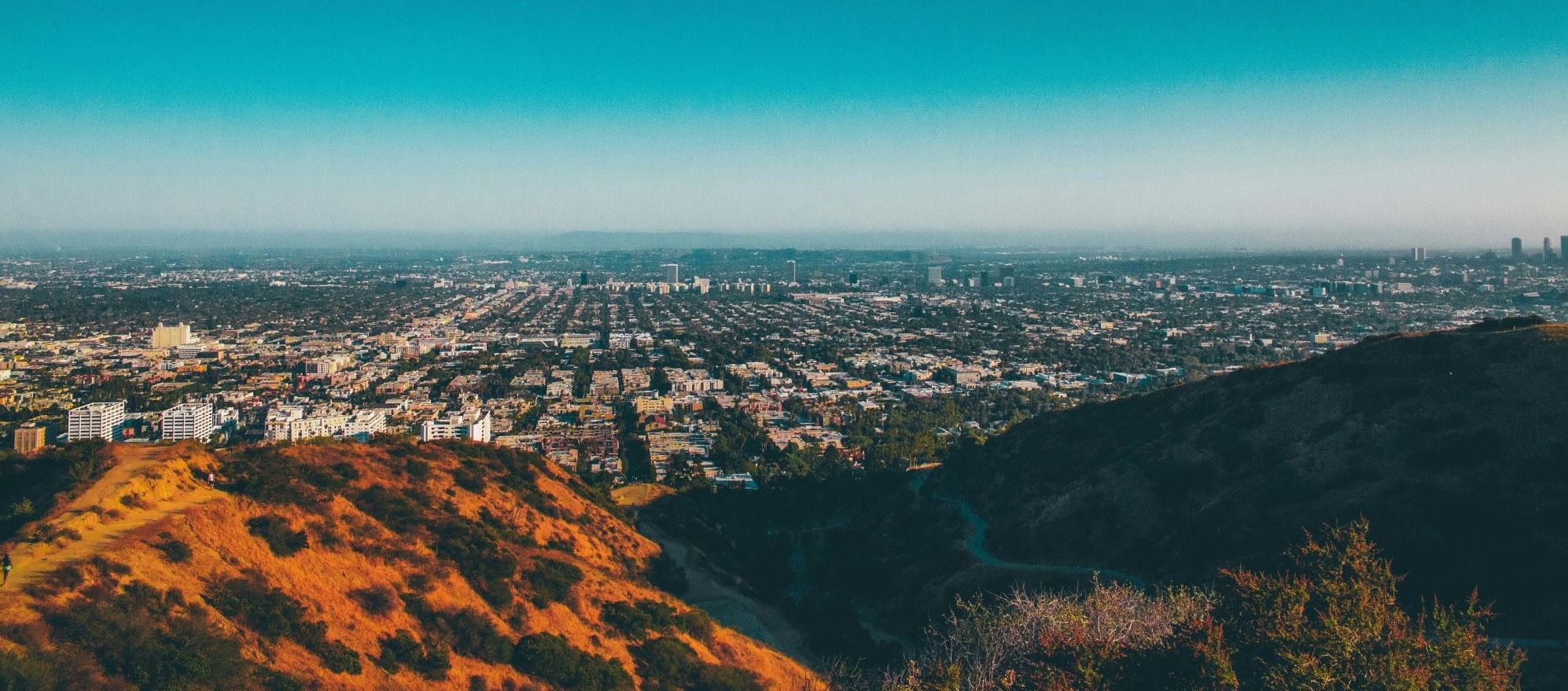 Panoramic view from the hills across the Los Angeles basin at golden hour