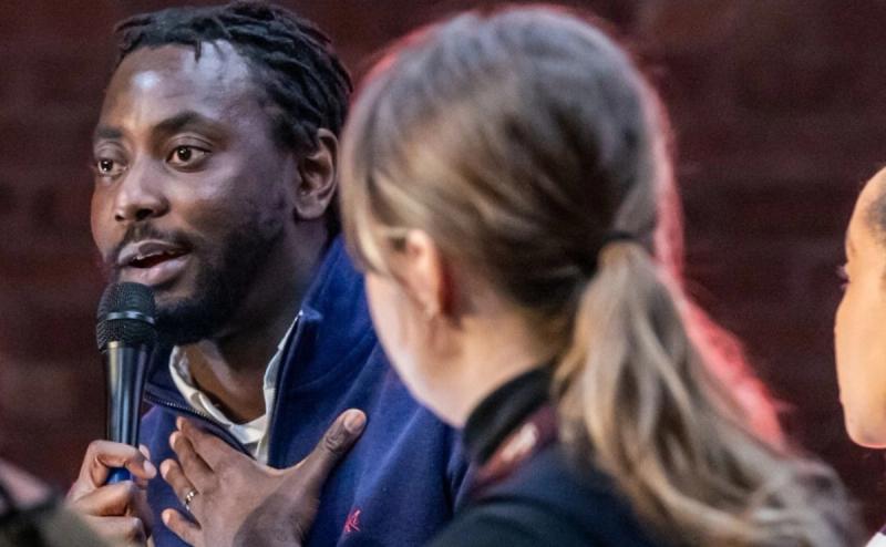 Akinwale delivering a keynote address on stage