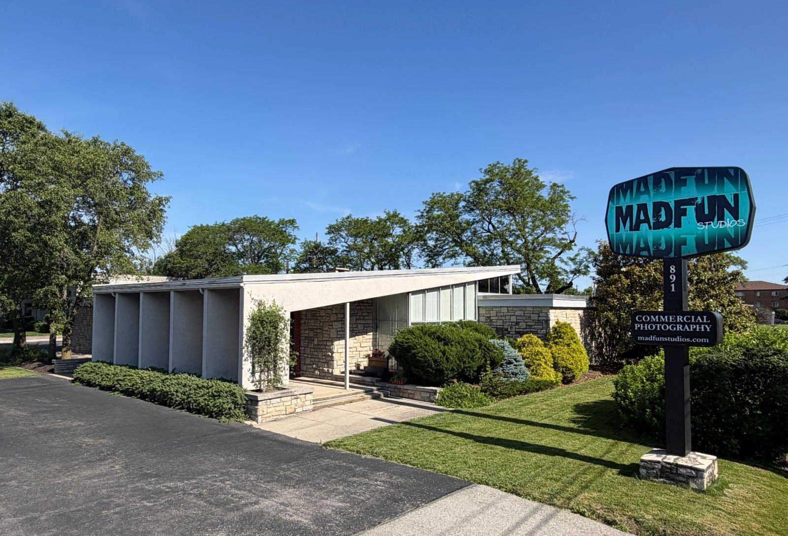 MADFUN Studios interior — reimagined 1950s bank building