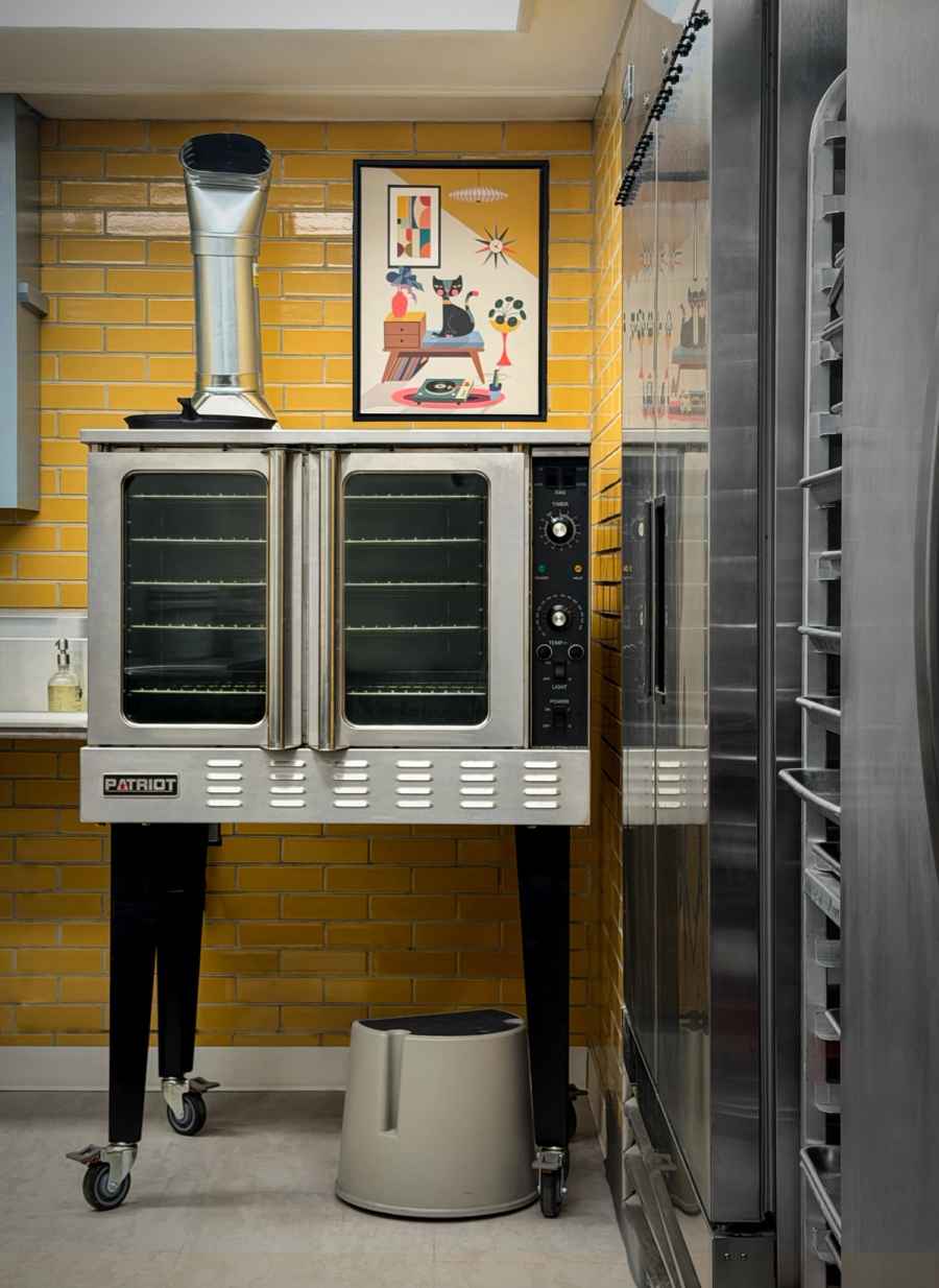 Kitchen looking out to the floor., commercial photography for Kitchen looking out to the floor.