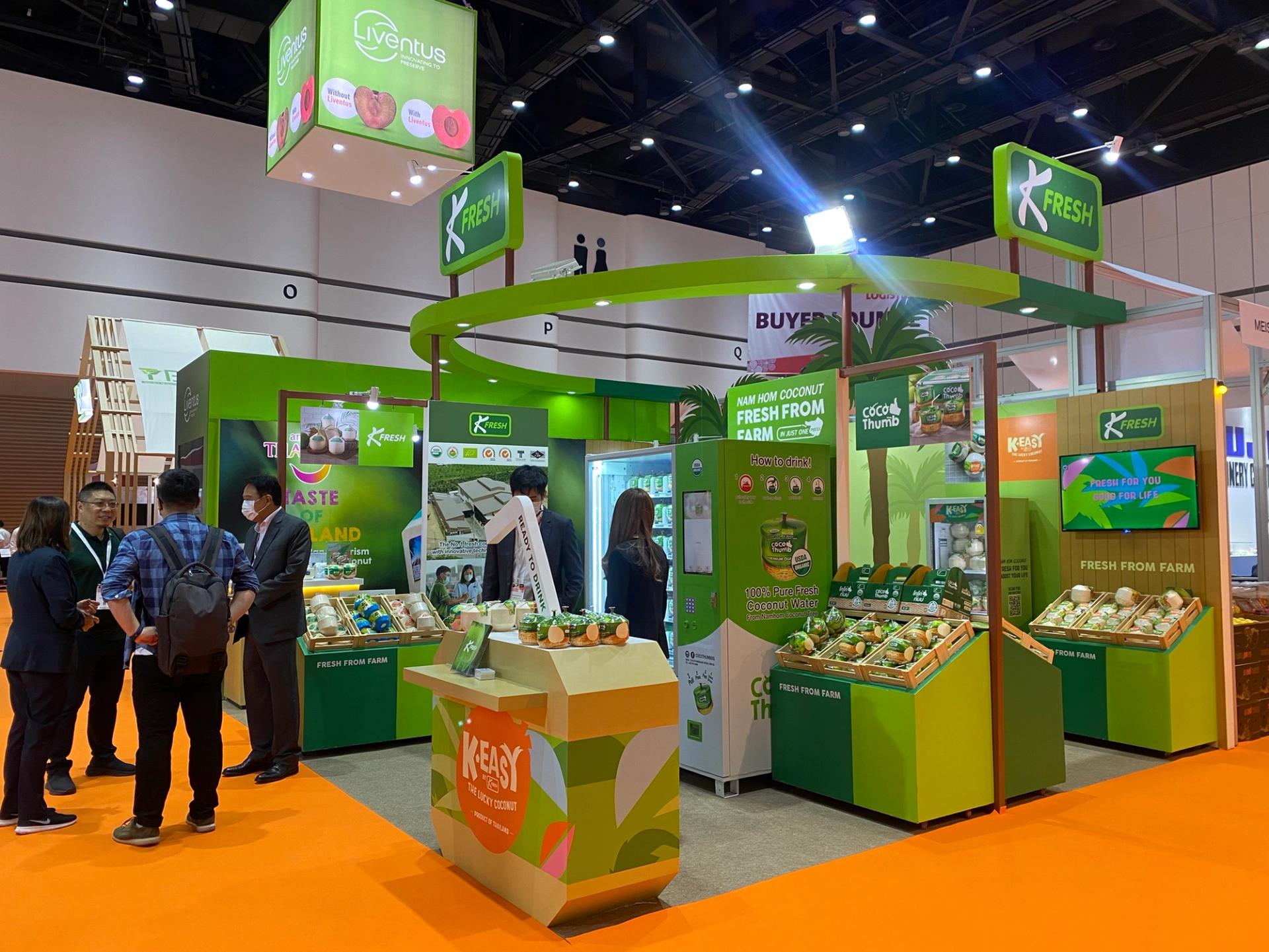 People in front of the K-Fresh booth