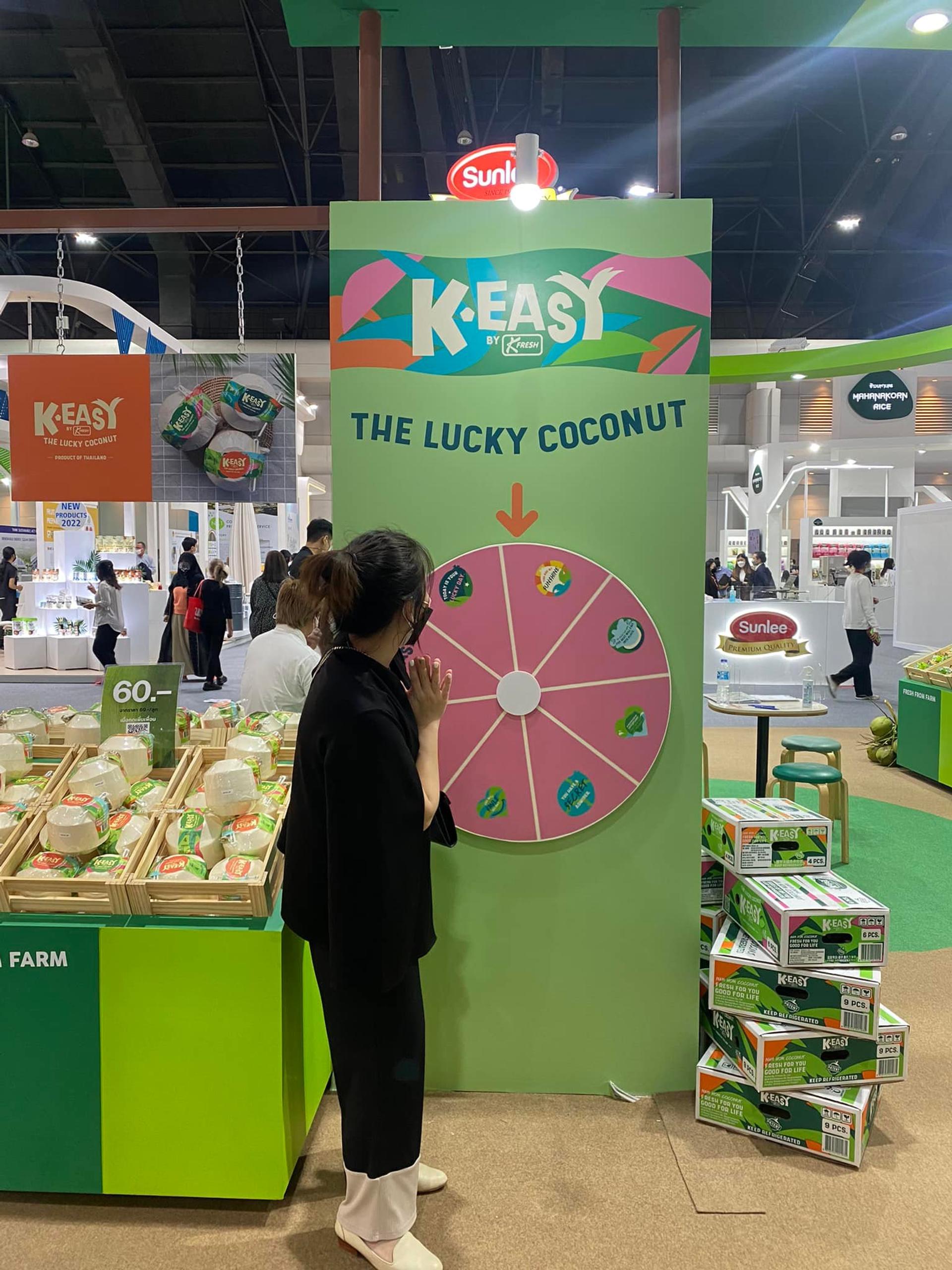 People look at the lucky coconut activity