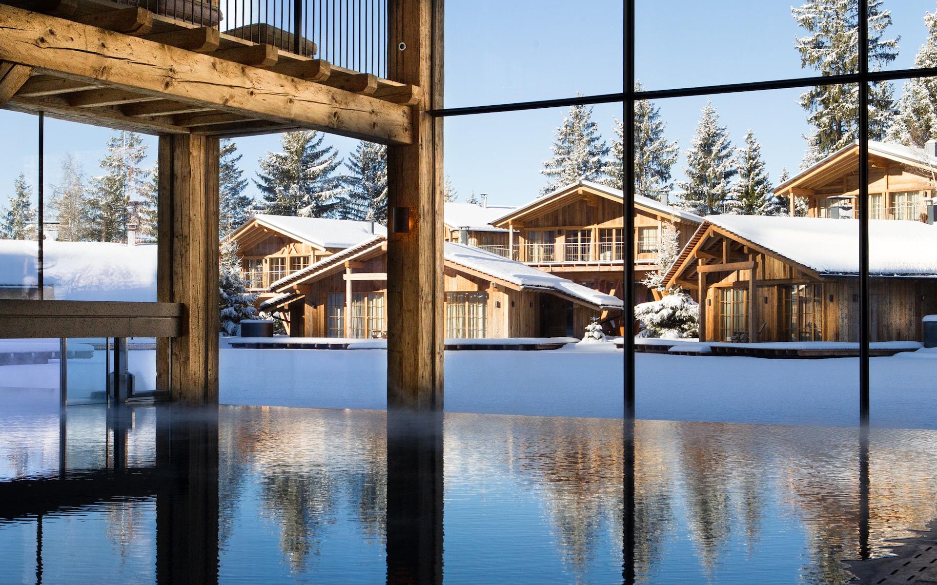 San Luis Retreat: indoor pool viewed through large windows with property reflected