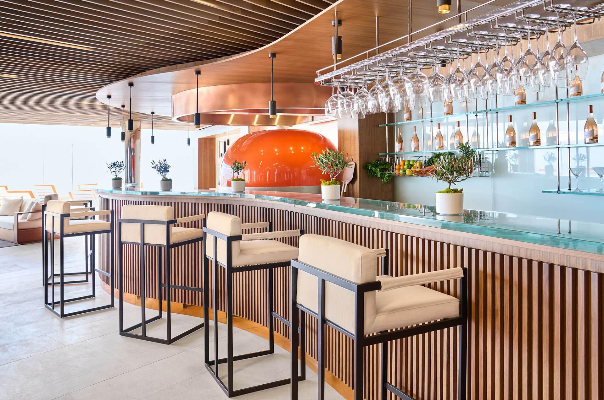 Modern bar with pendant lights and elegant design