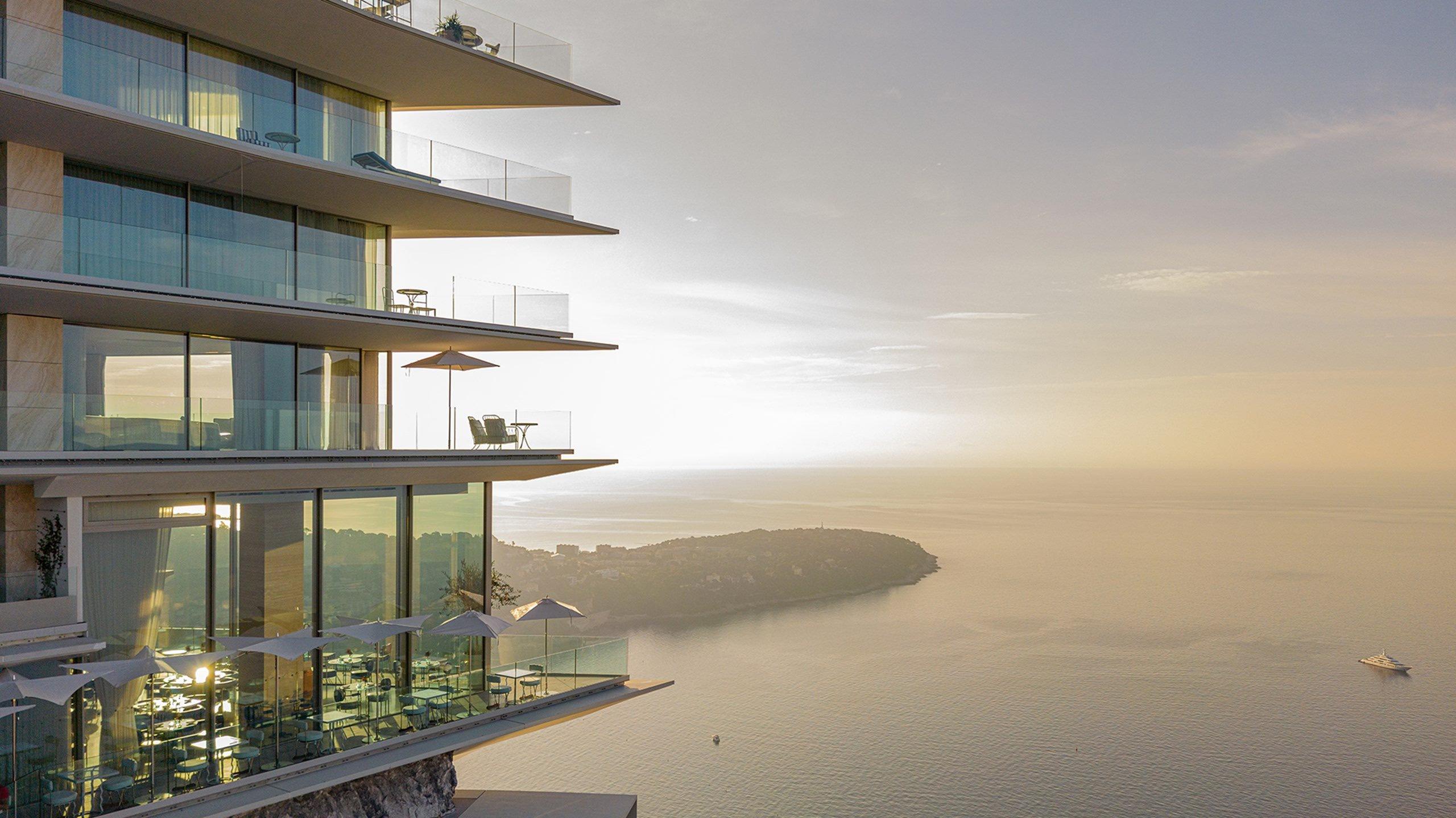 Maybourne Riviera: glass-fronted suites overlooking Mediterranean at sunset