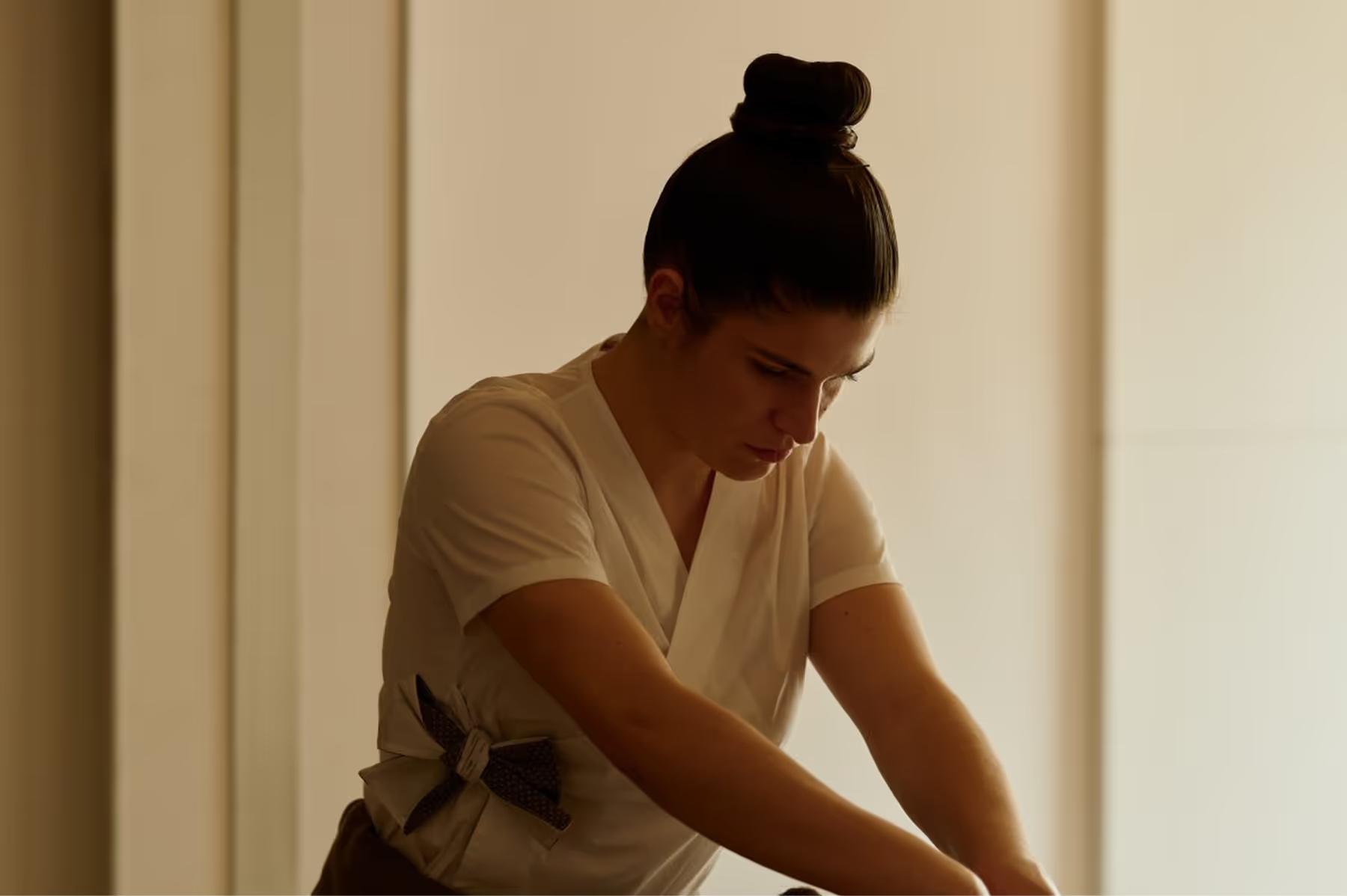 Amanzoe: massage or wellness treatment in progress in a light-filled room