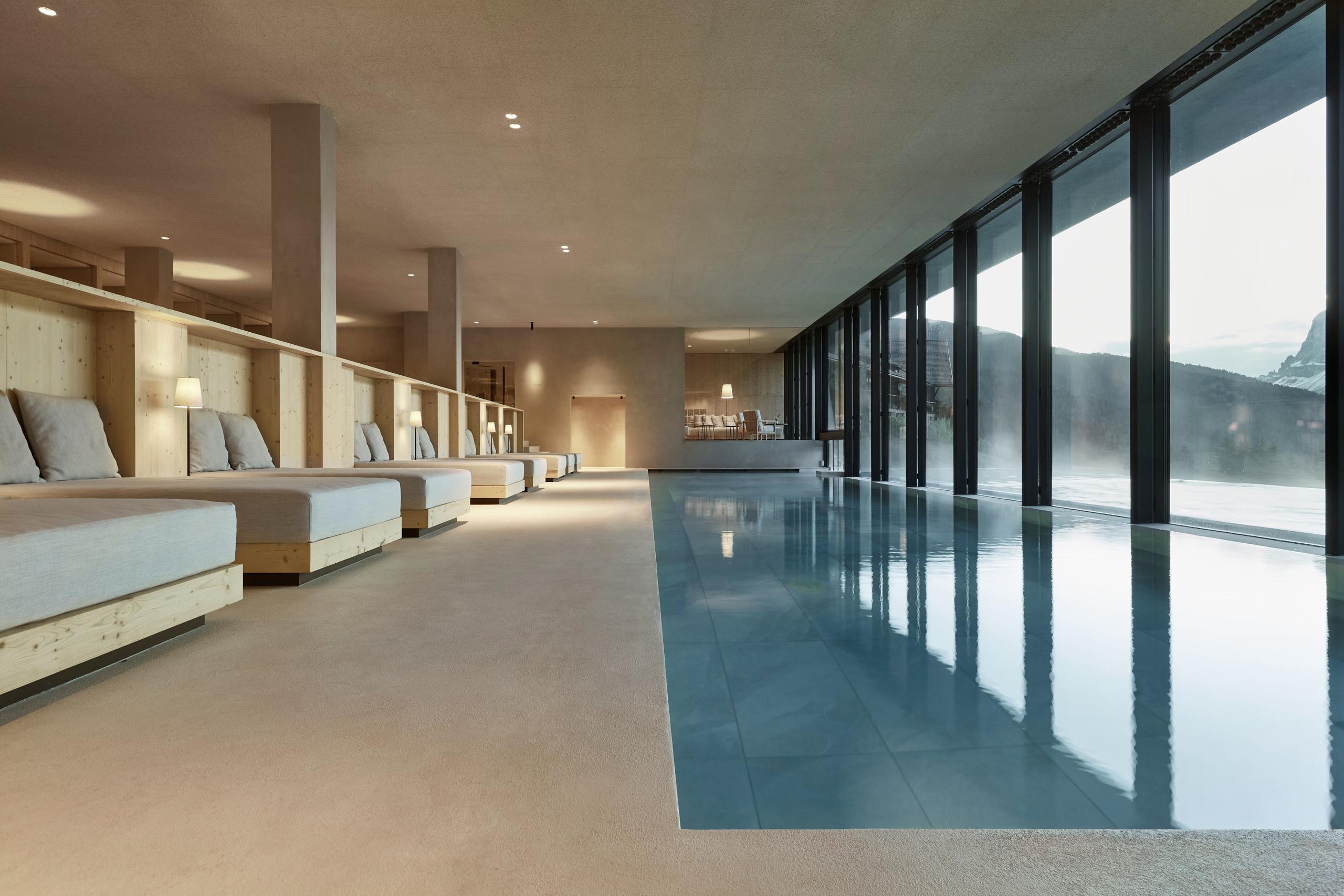 Forestis: a yoga or wellness studio with soft lighting, natural materials, and a calm minimalist interior