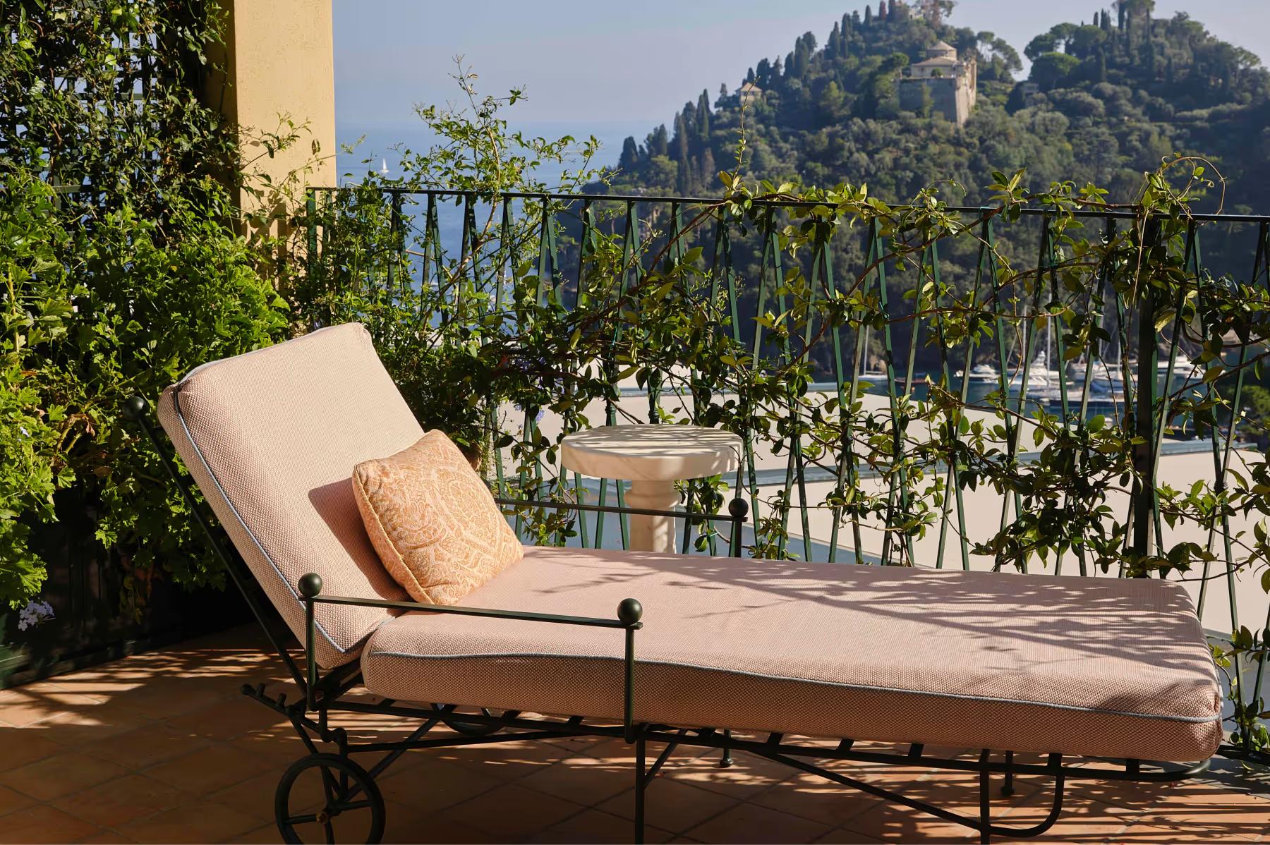 Splendido: a balcony lounge area with upholstered seating and unobstructed sea vista