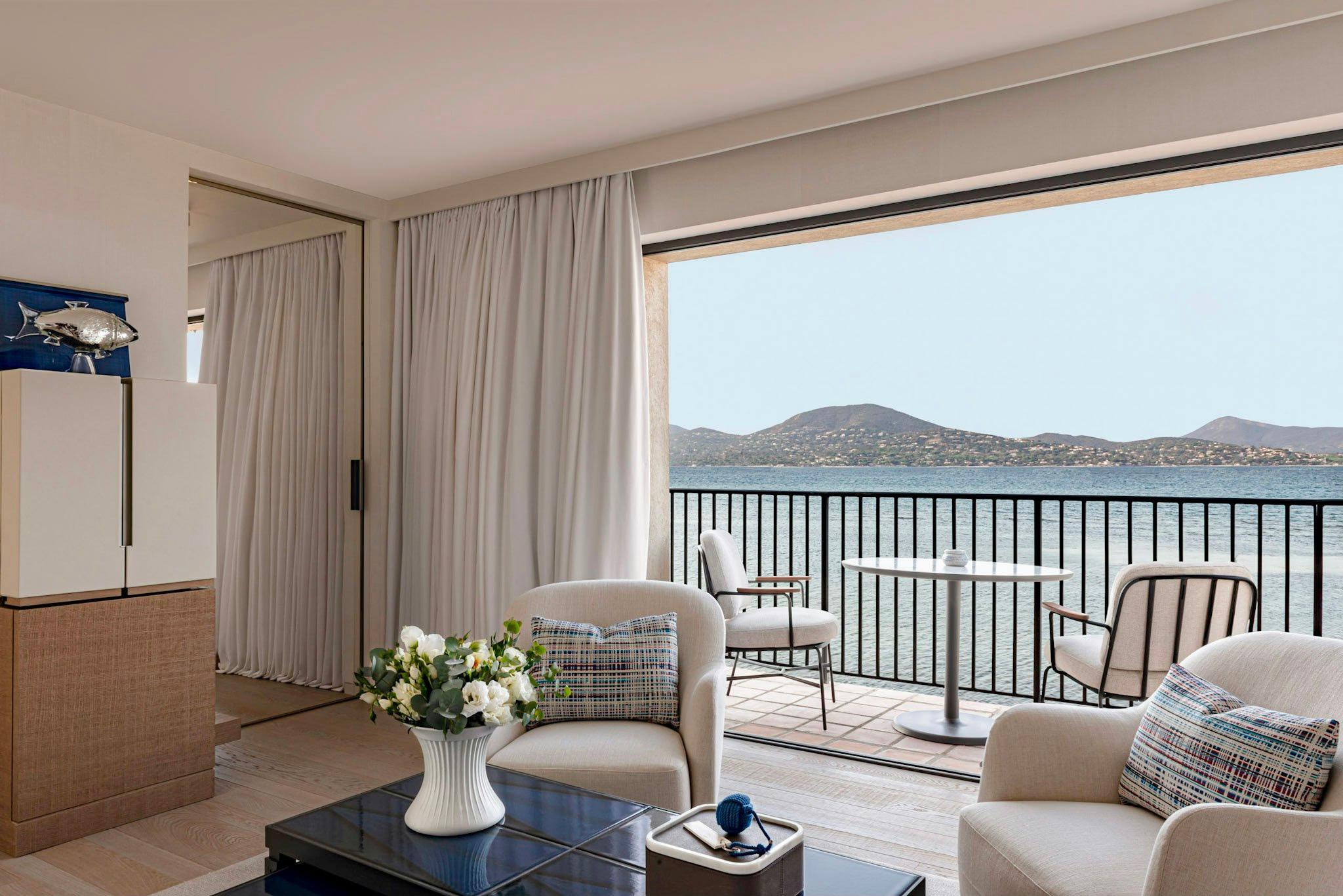 Cheval Blanc St-Tropez: sitting area with seating chairs and terrace overlooking bay