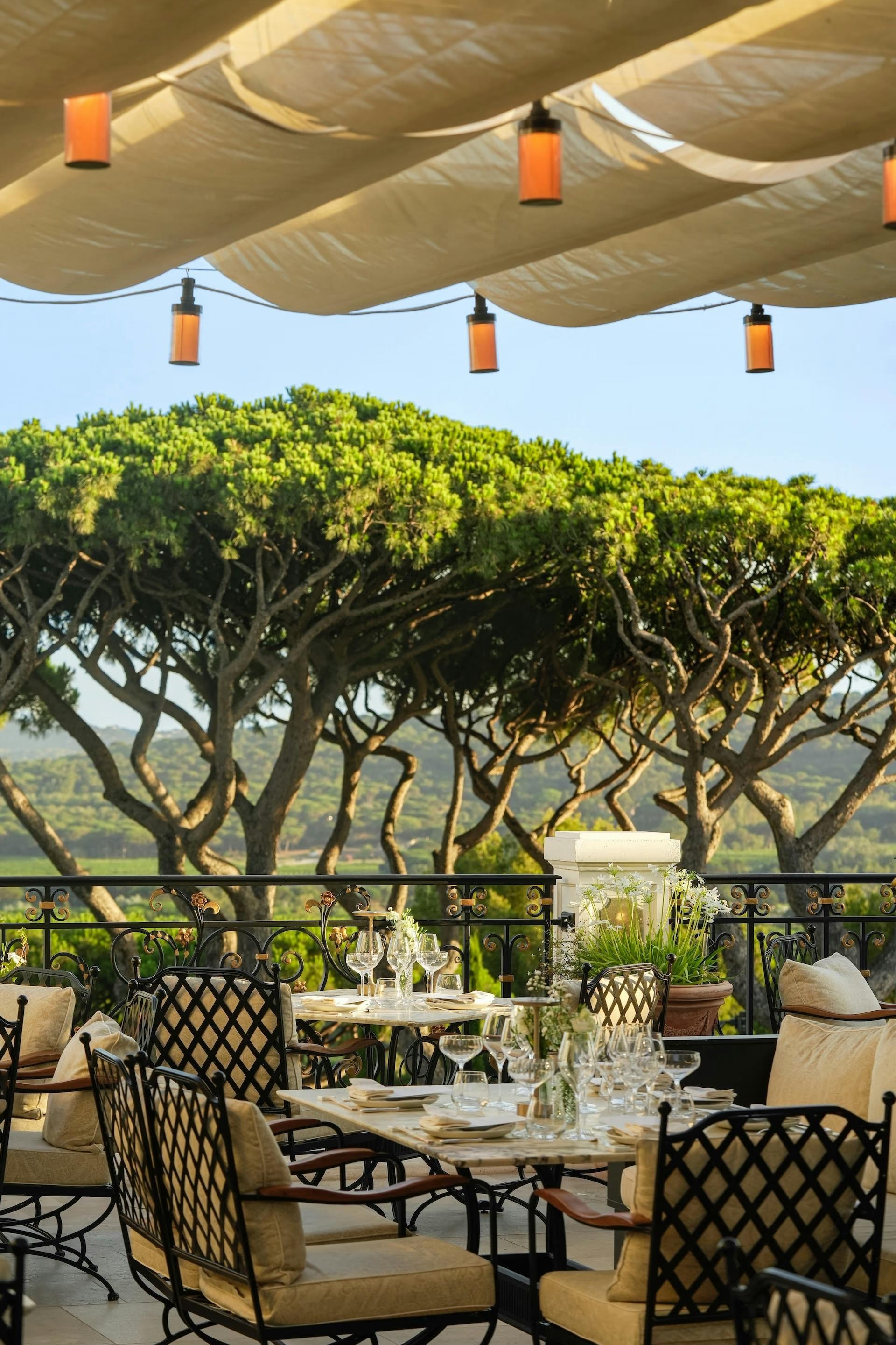 The terrace at Matsuhisa Saint-Tropez, under a canopy hung with lanterns