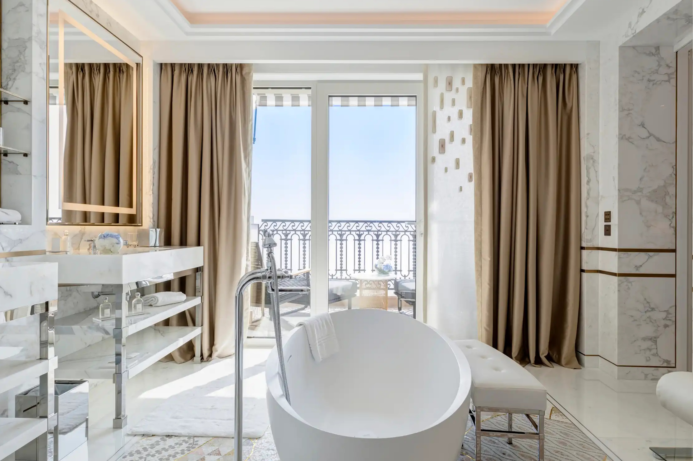 Hôtel de Paris Monte-Carlo: marble bathroom with soaking tub and balcony overlooking Mediterranean landscape