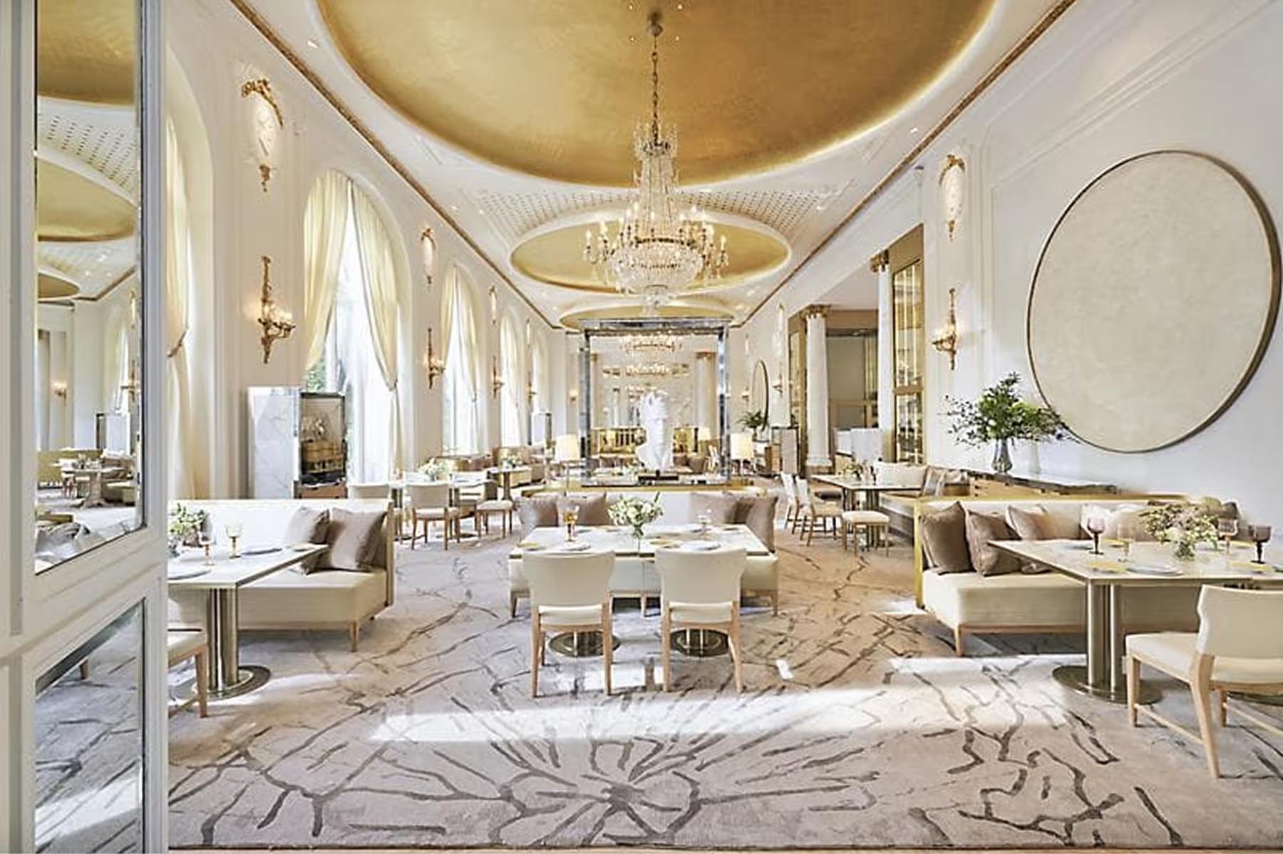 Mandarin Oriental Ritz, Madrid: grand Belle Époque dining room with gilt ceiling and crystal chandeliers
