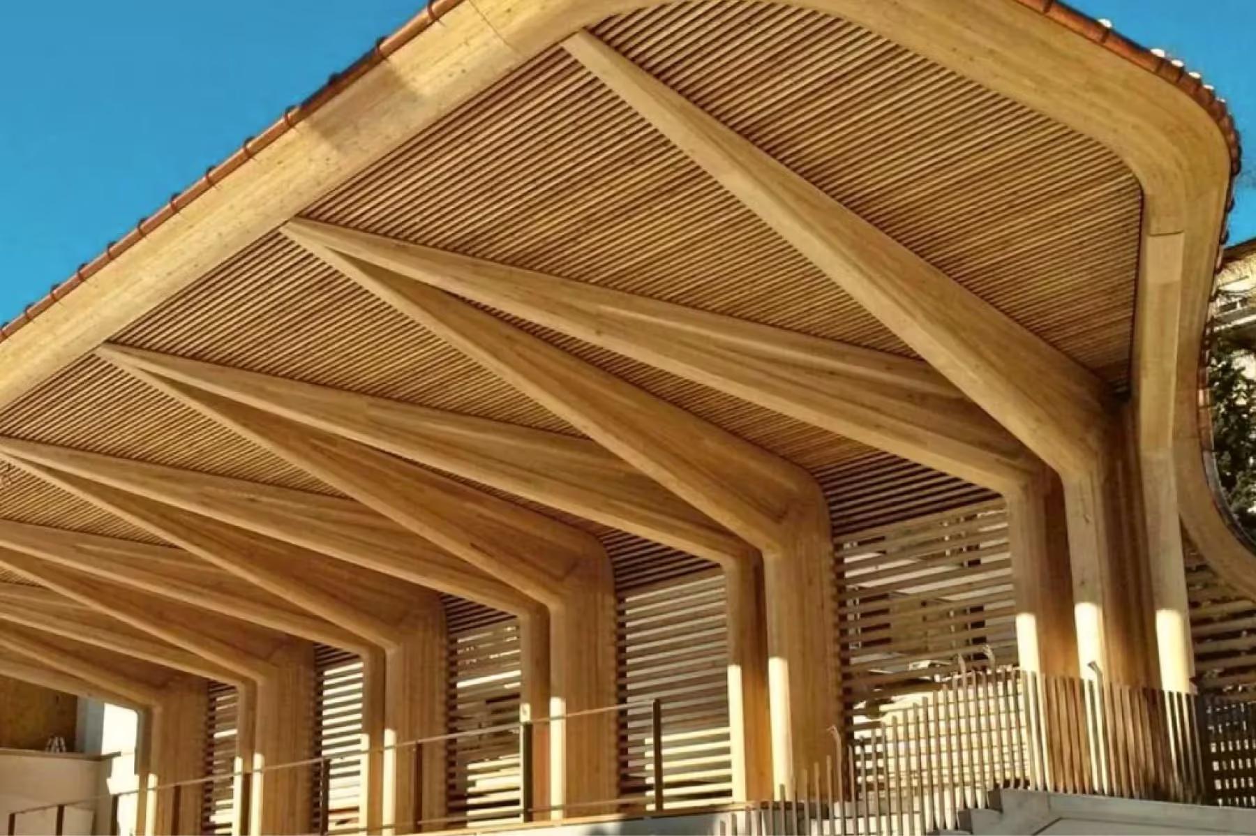 Kulm Hotel St. Moritz: a wooden pergola structure photographed against a bright blue sky