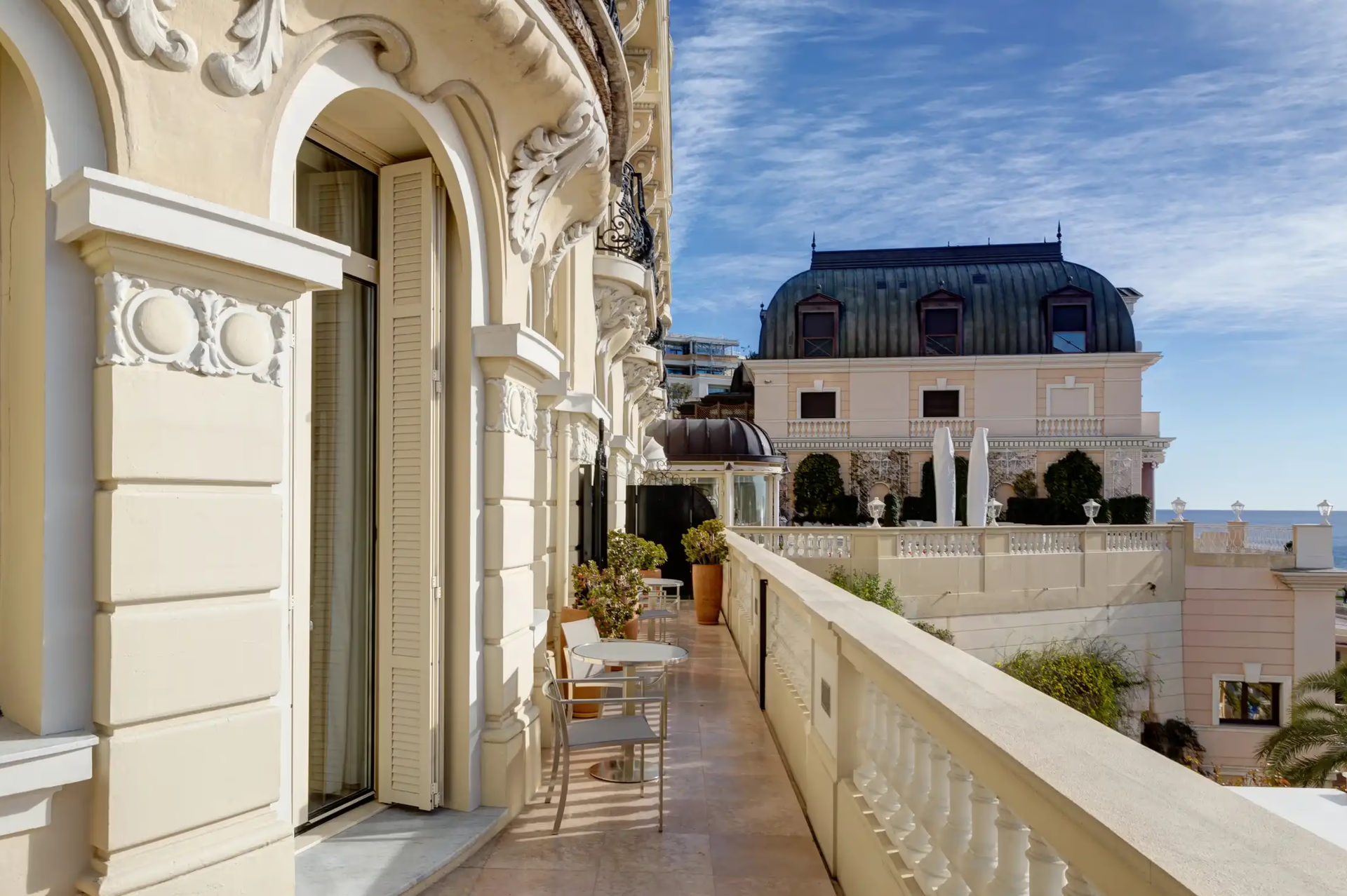 Hôtel Hermitage Monte-Carlo: rooftop terrace with soaking tub, lounge seating, sea views and arched stone archways