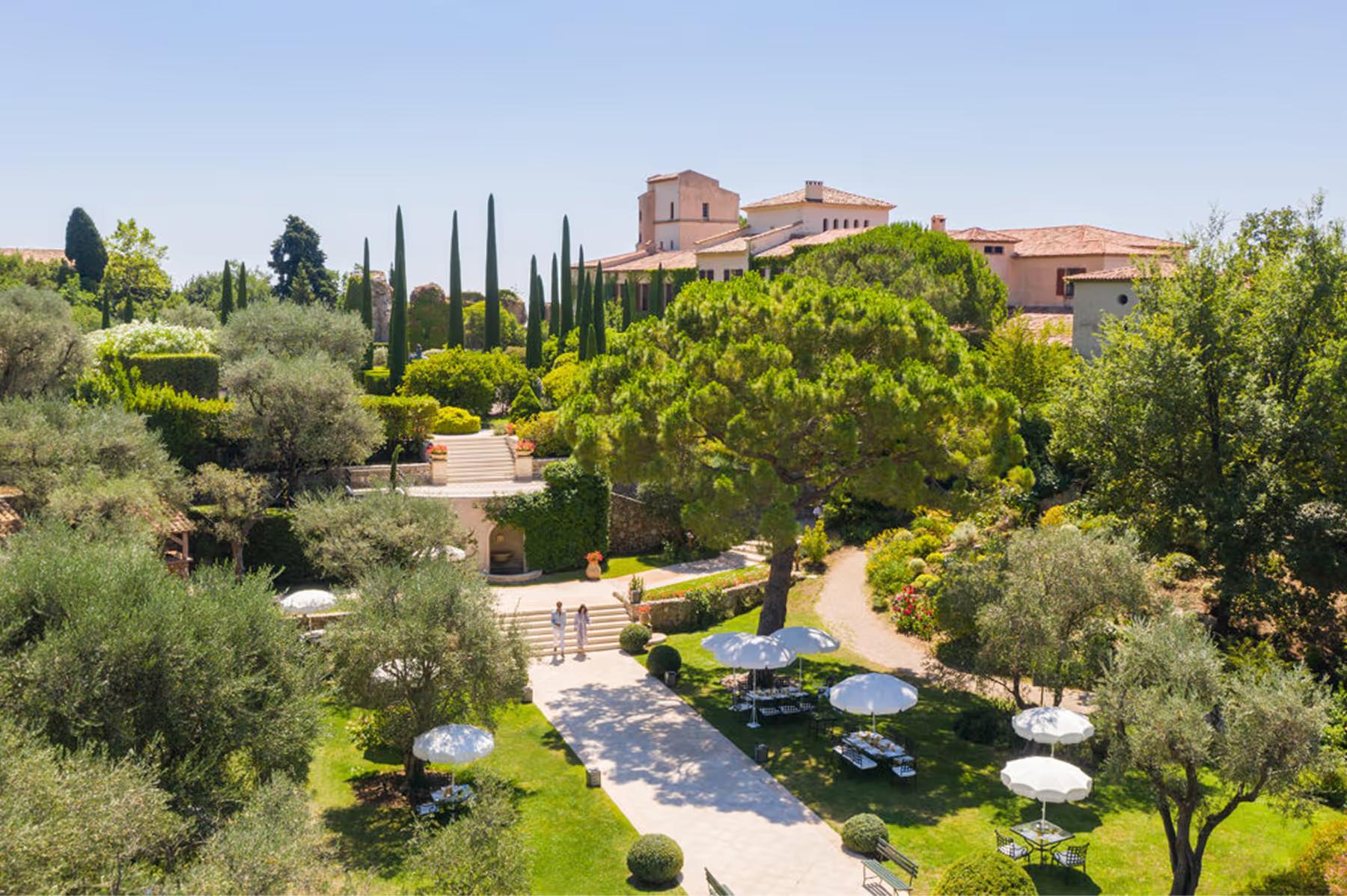 Château Saint Martin & Spa: estate grounds with château, olive groves, and heated infinity pool set in the landscape