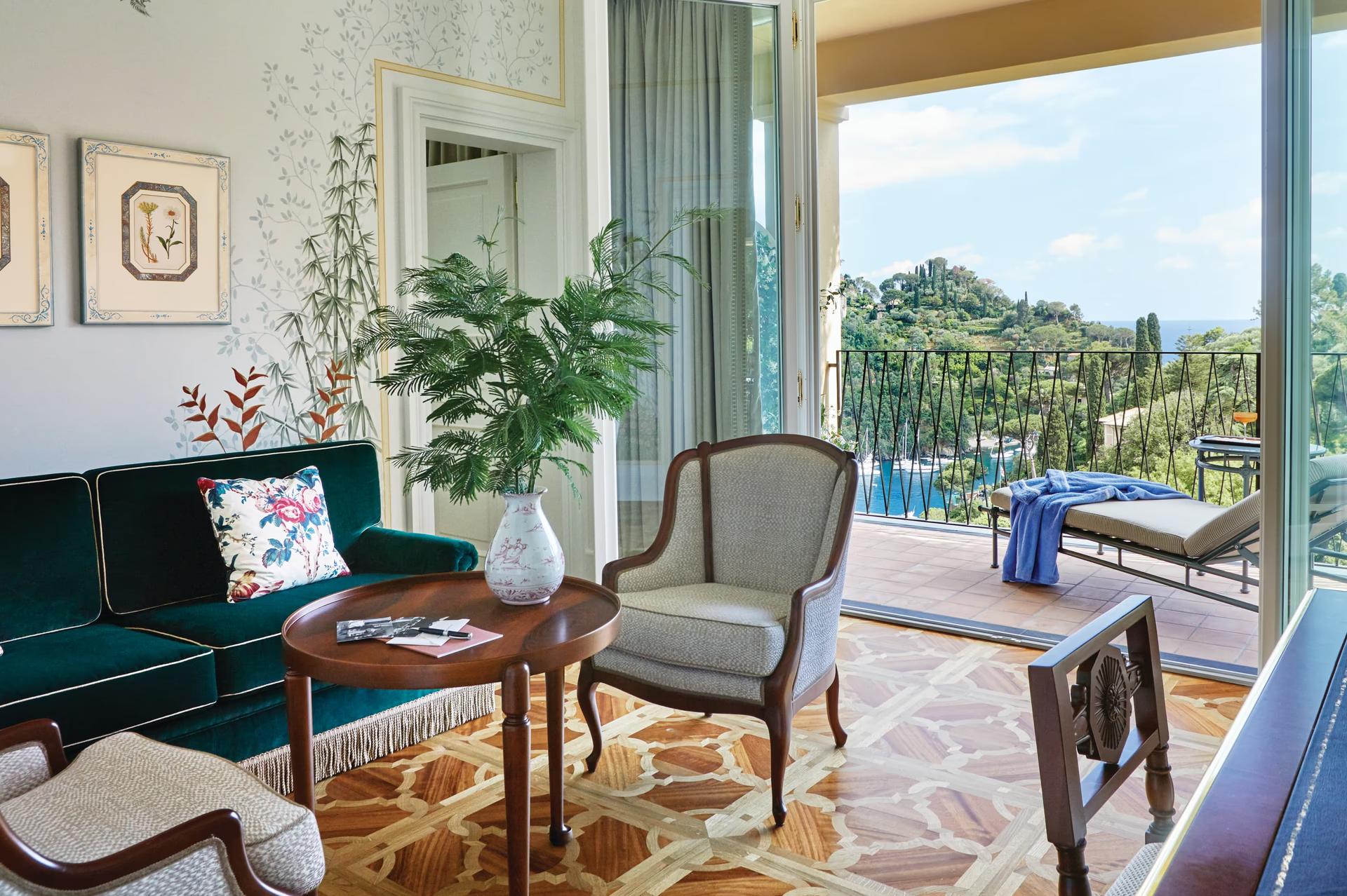 Splendido: a hallway with arched doorways, botanical wallpaper, and light-filled spaces