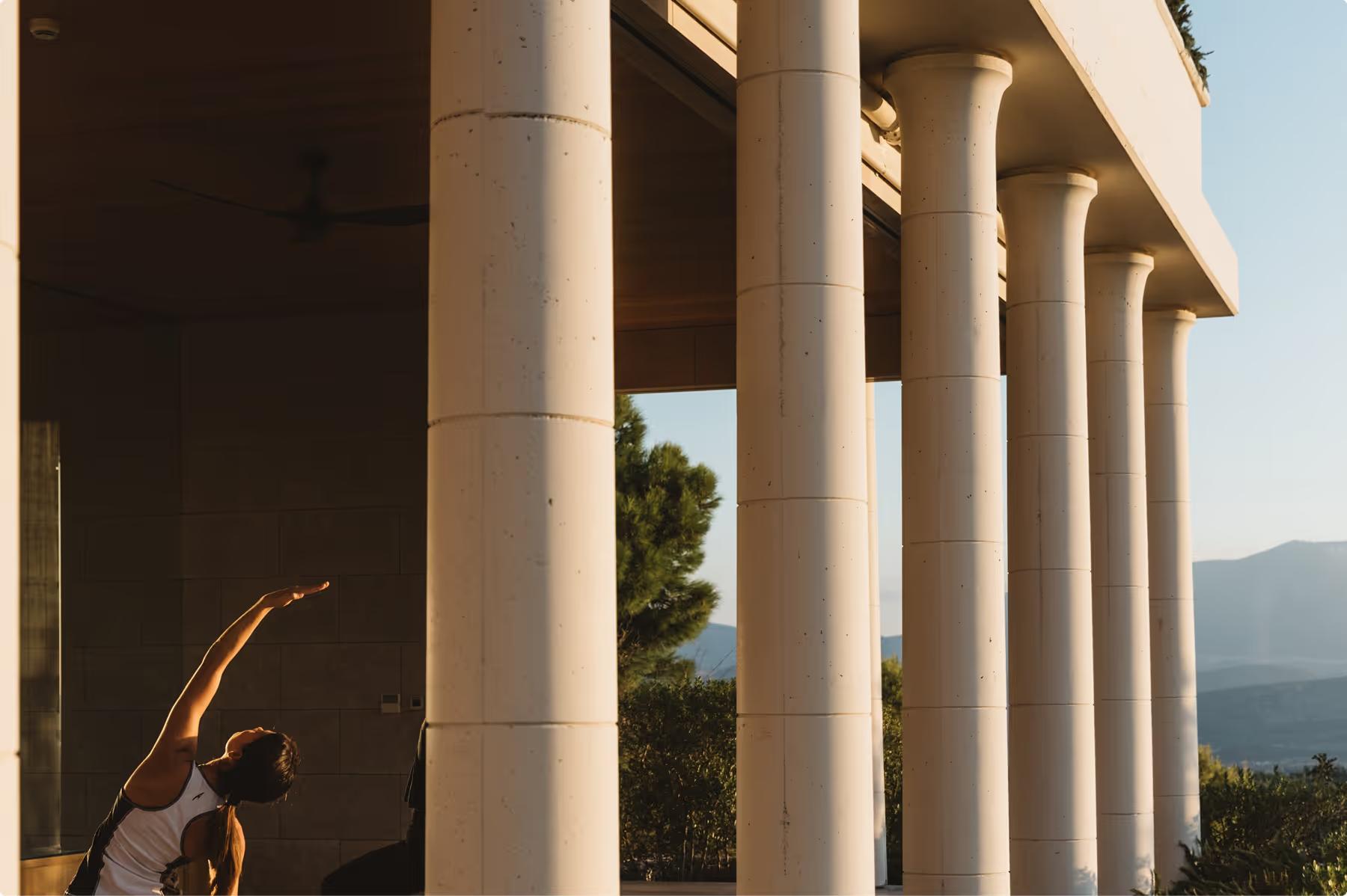 Amanzoe: fitness facility with yoga mat and coastal landscape views