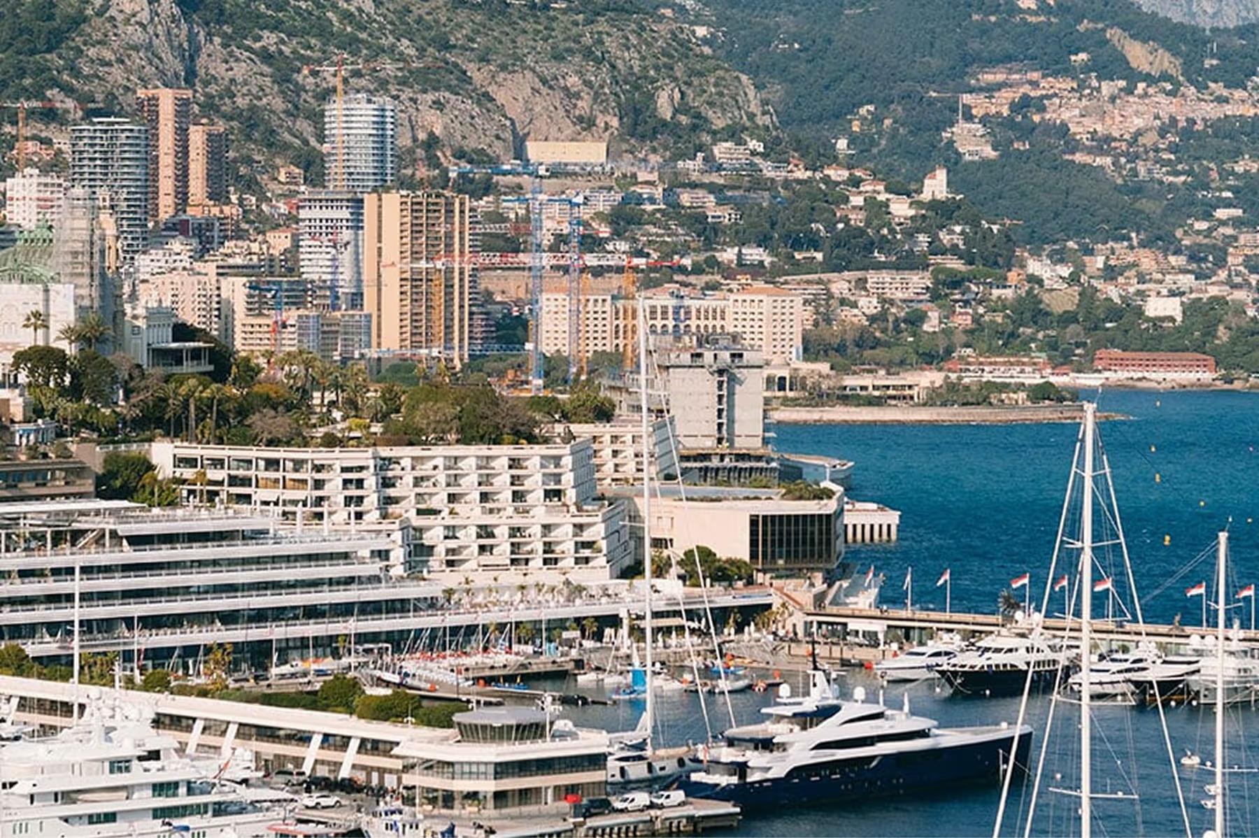 Maybourne Riviera: coastal landscape with boats and waterfront development