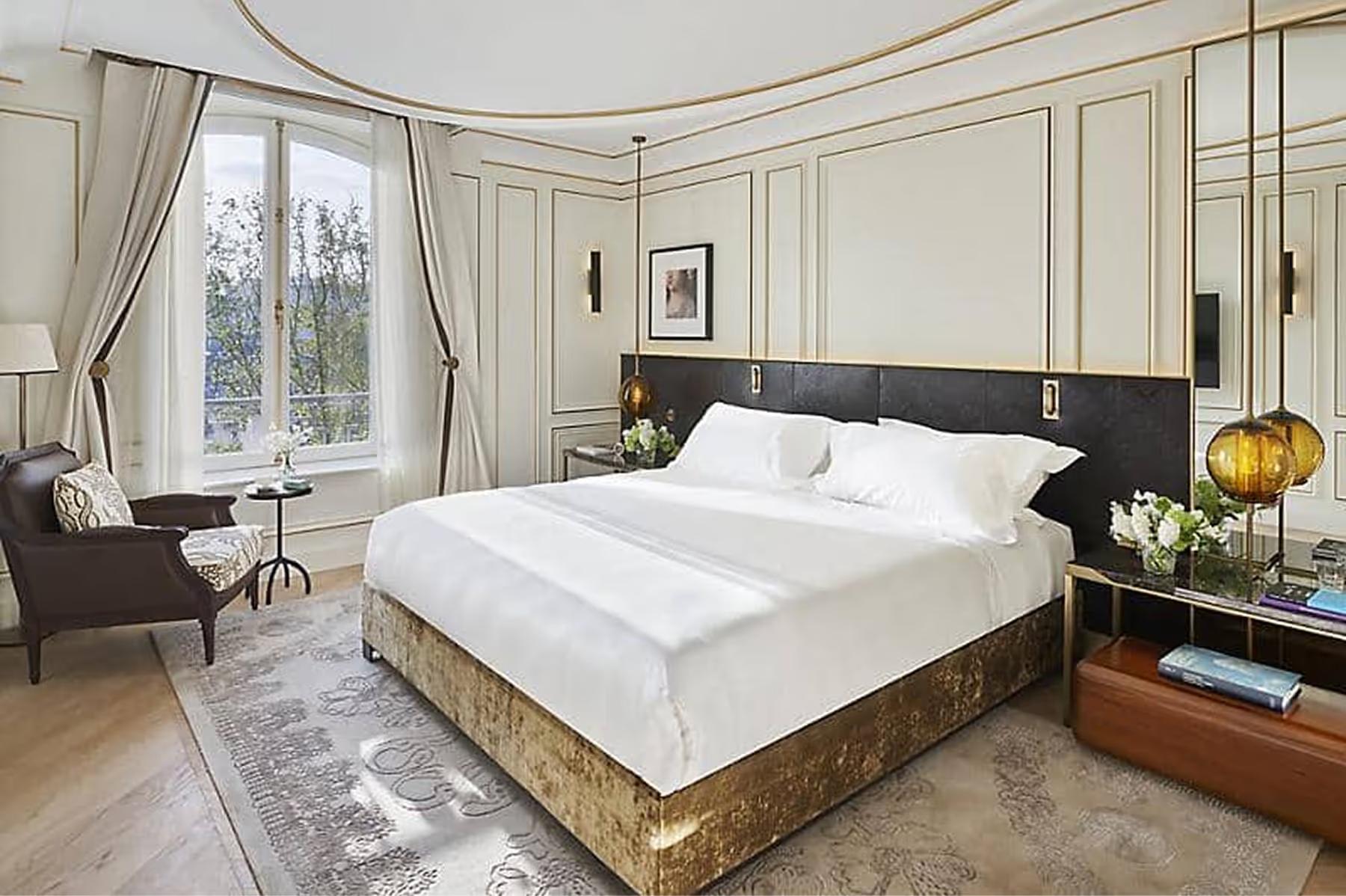 Mandarin Oriental Ritz, Madrid: bedroom with black-framed bed, draped windows, and curved architectural details