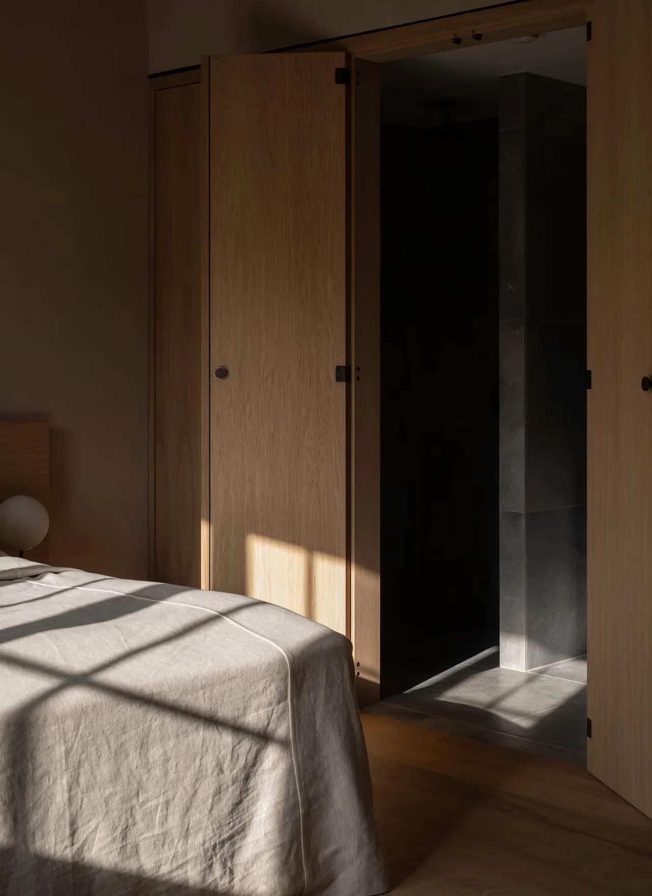 Morning light across a serene Copenhagen bedroom