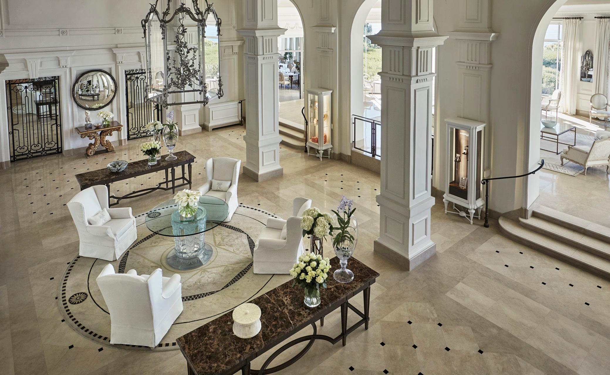 Grand-Hôtel du Cap-Ferrat: grand foyer with classical columns, marble floors, and symmetrical layout