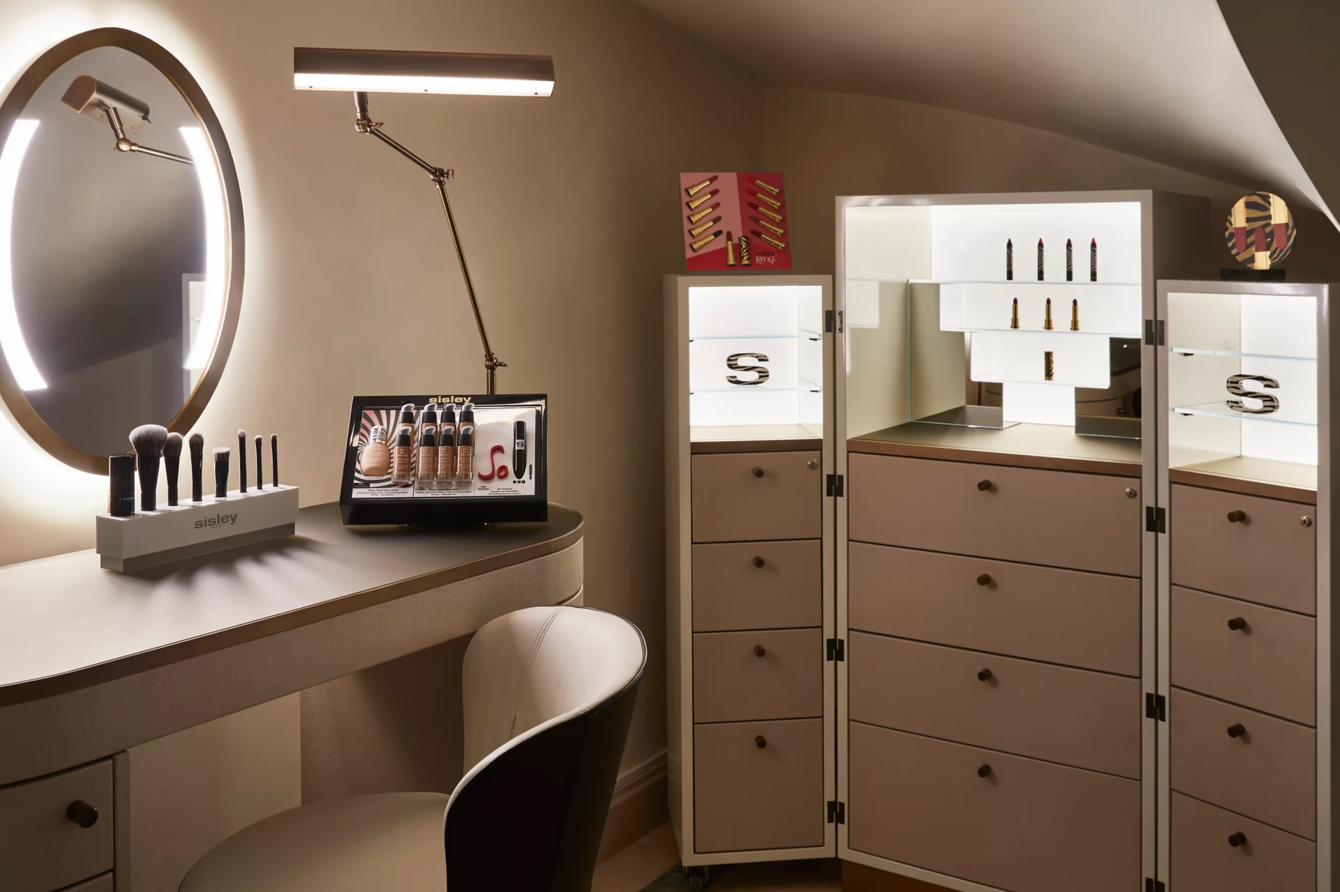 Hôtel de Crillon: spa dressing room with three-panel mirror and organized storage cabinetry