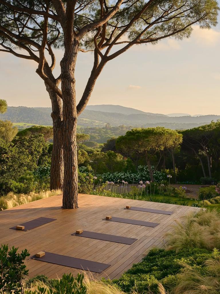 The yoga deck in the pines above the valley at Château de La Messardière