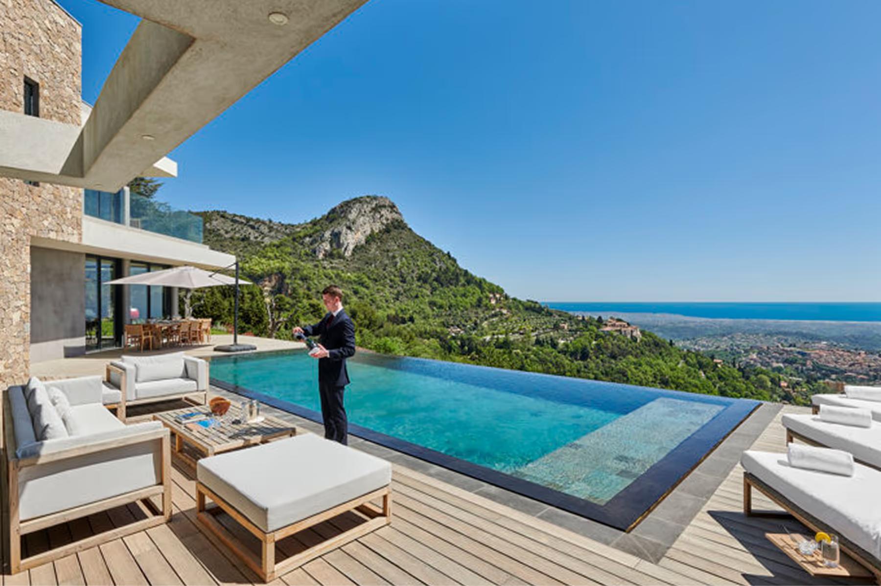 Château Saint Martin & Spa: clifftop villa terrace with heated infinity pool and sea views