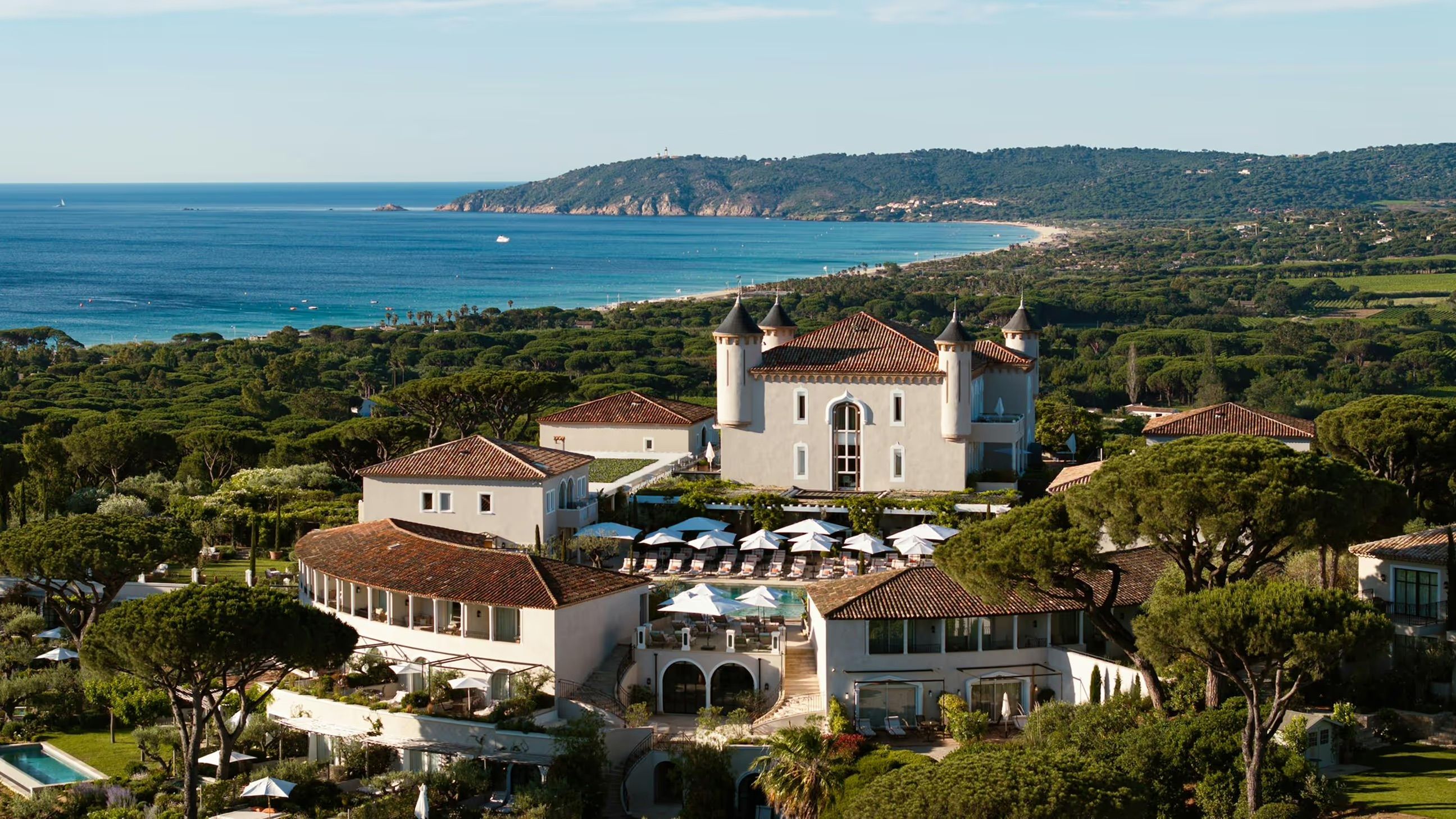 The turreted Château de la Messardière above the bay of Pampelonne