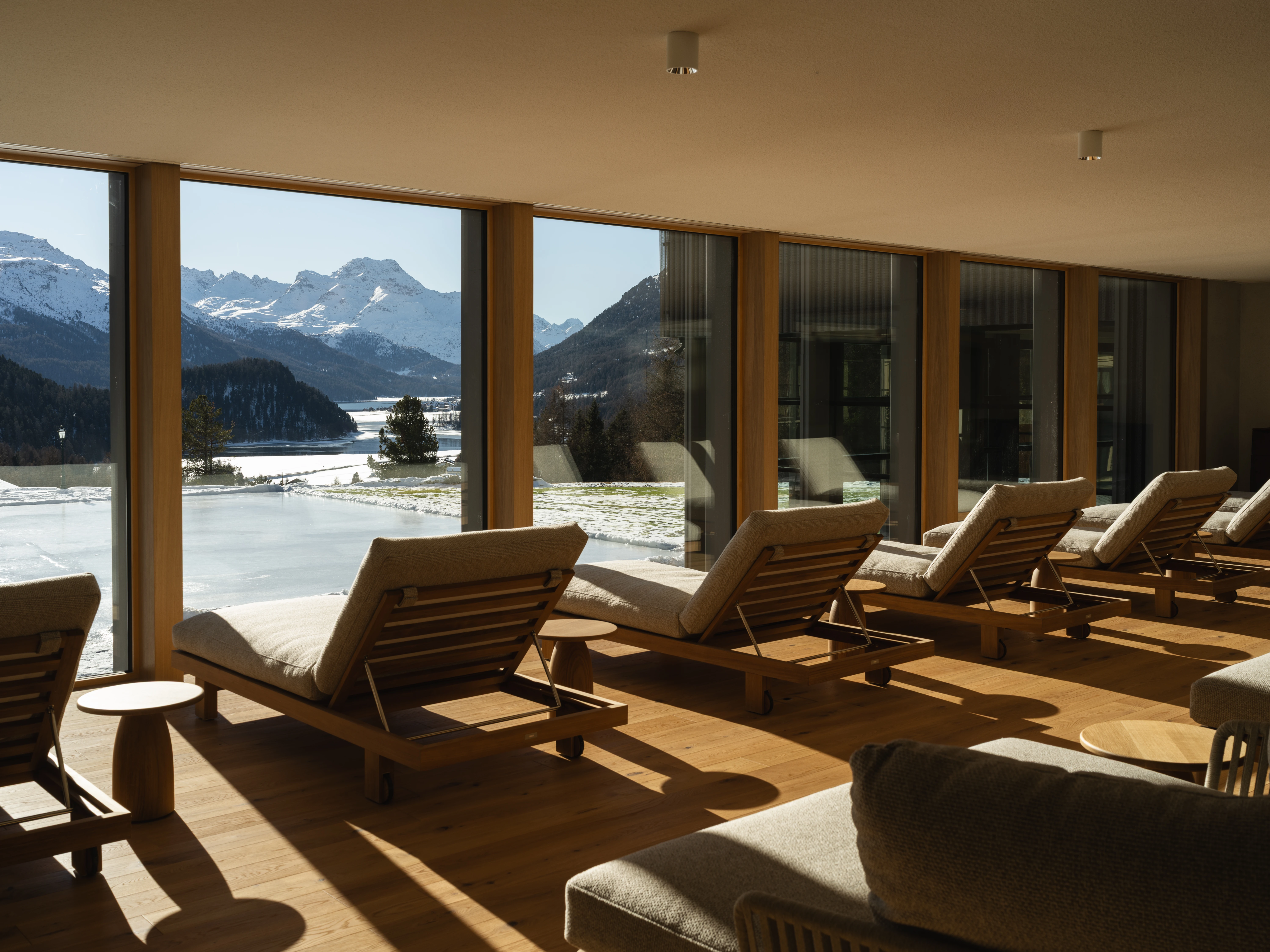 The relaxation room at Suvretta House with loungers facing the Engadin mountains