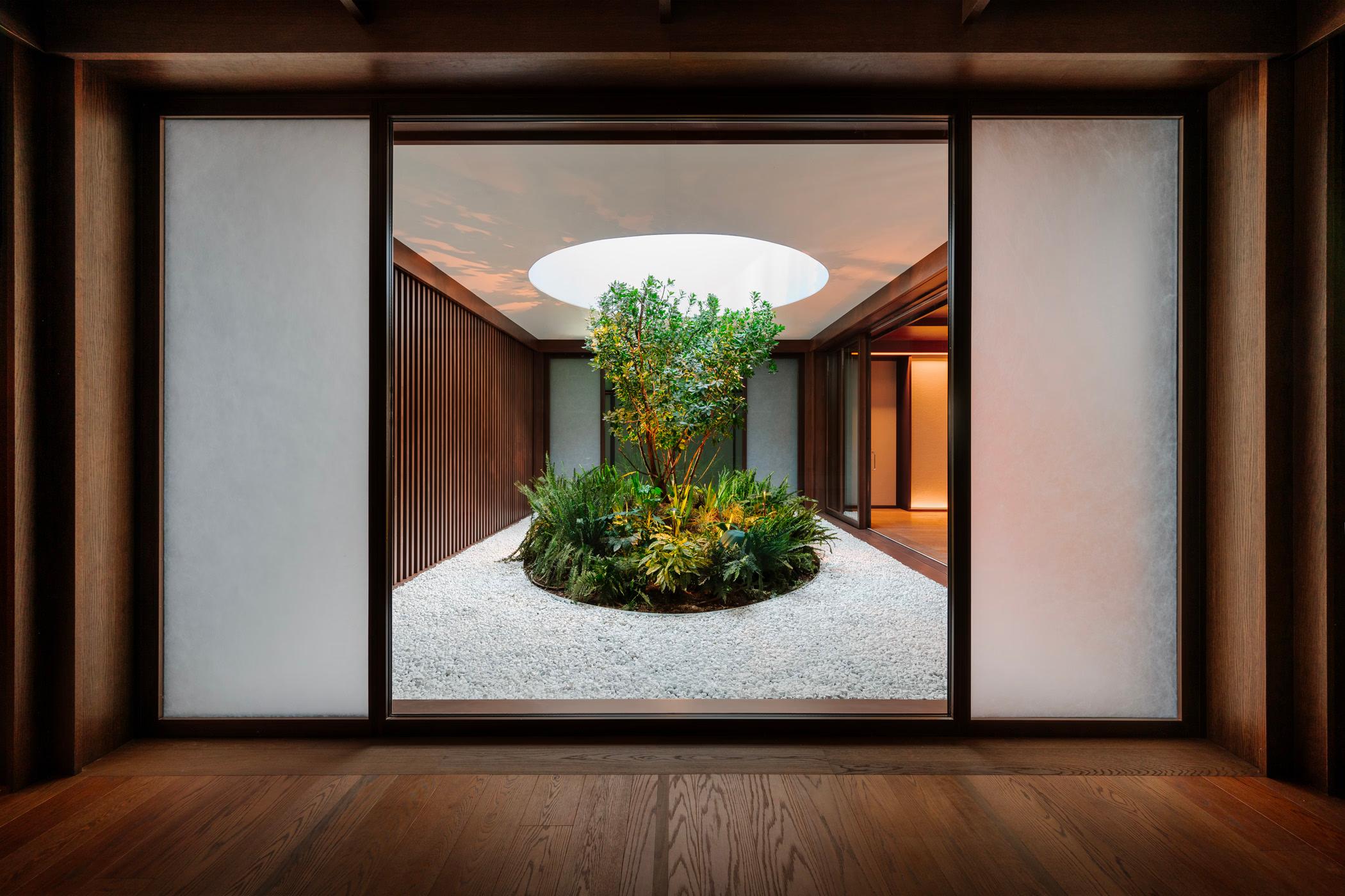 Mandarin Oriental, Lake Como: modern spa treatment room with recessed lighting, natural skylight, and serene minimalist design
