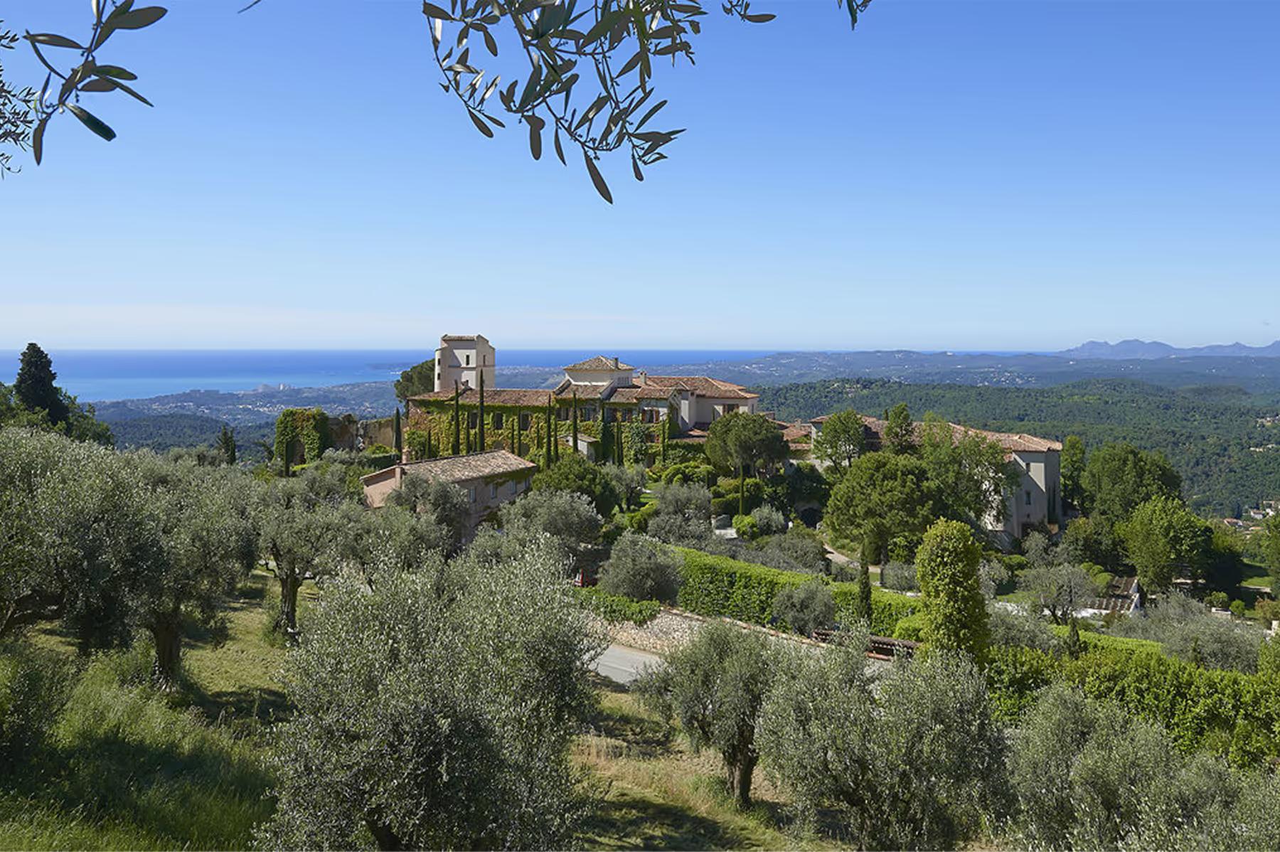 Château Saint Martin & Spa: hilltop château with olive trees and infinity pool overlooking the Mediterranean