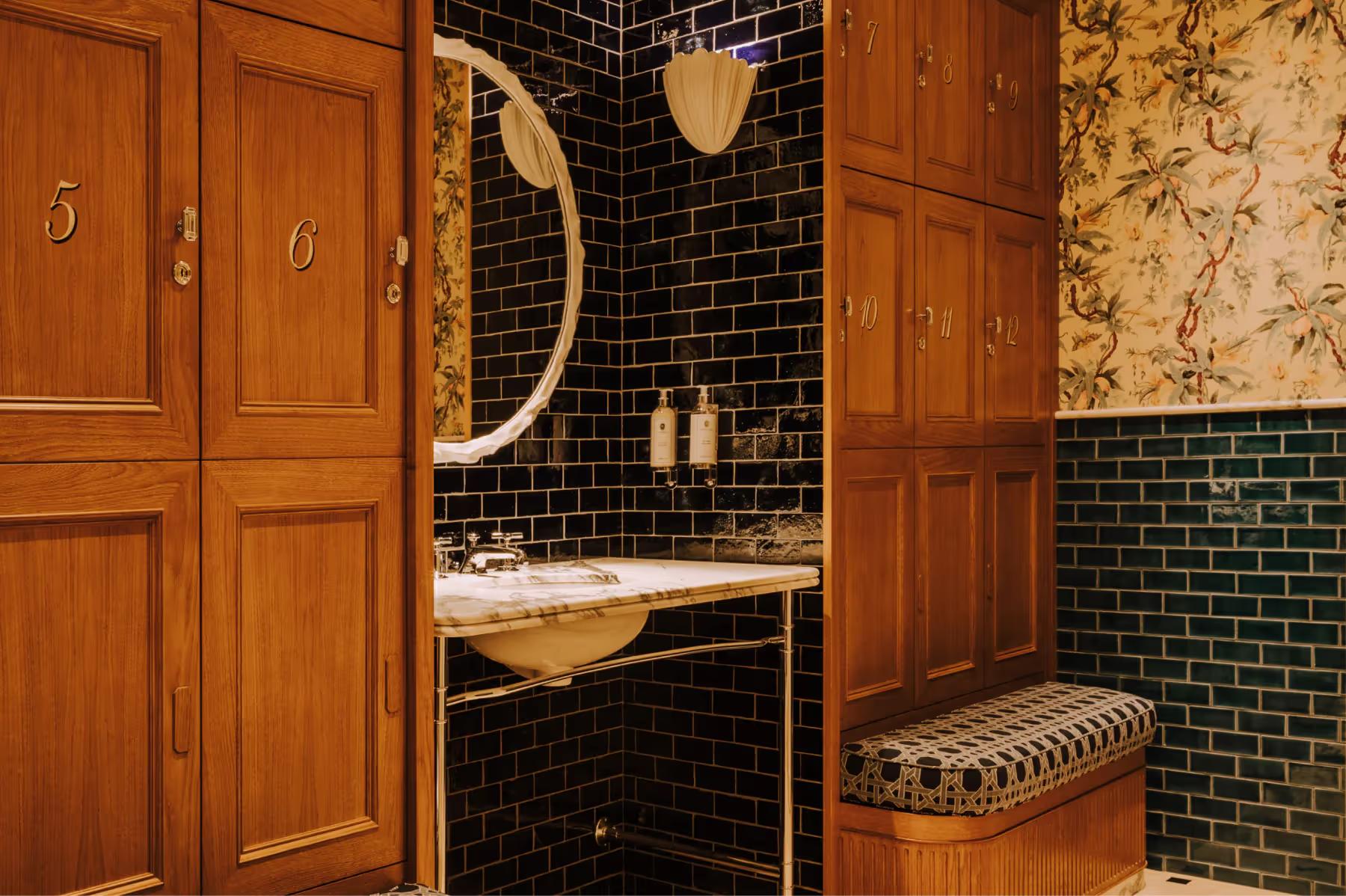 Saint James: spa interior with wood paneling, chrome ladder towel rack, and mirror detail