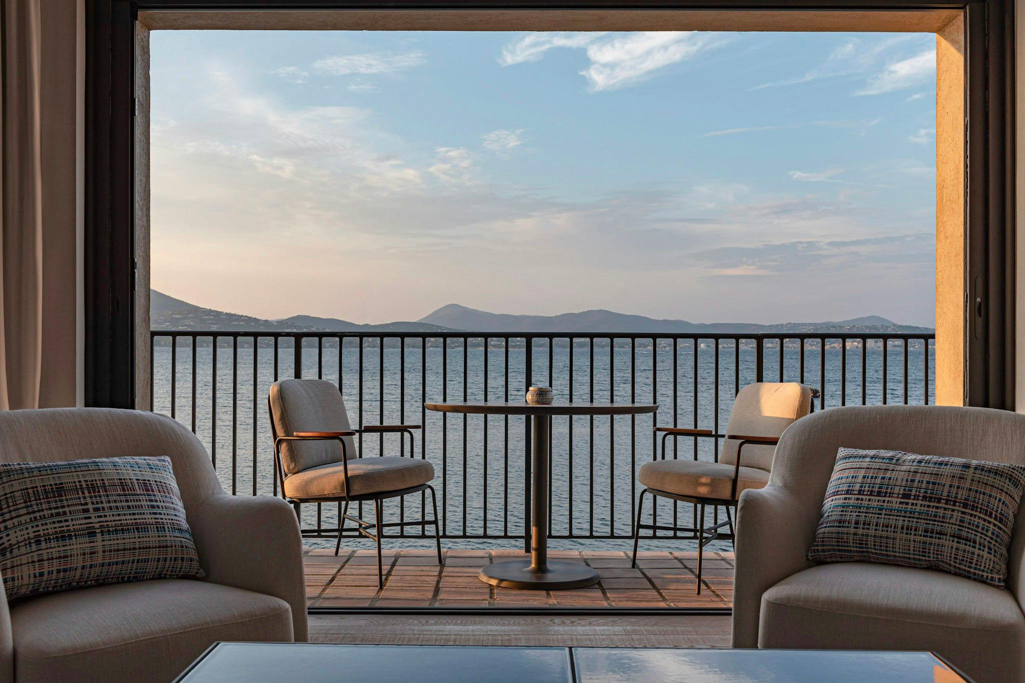 Terrace seating for two with expansive Mediterranean view