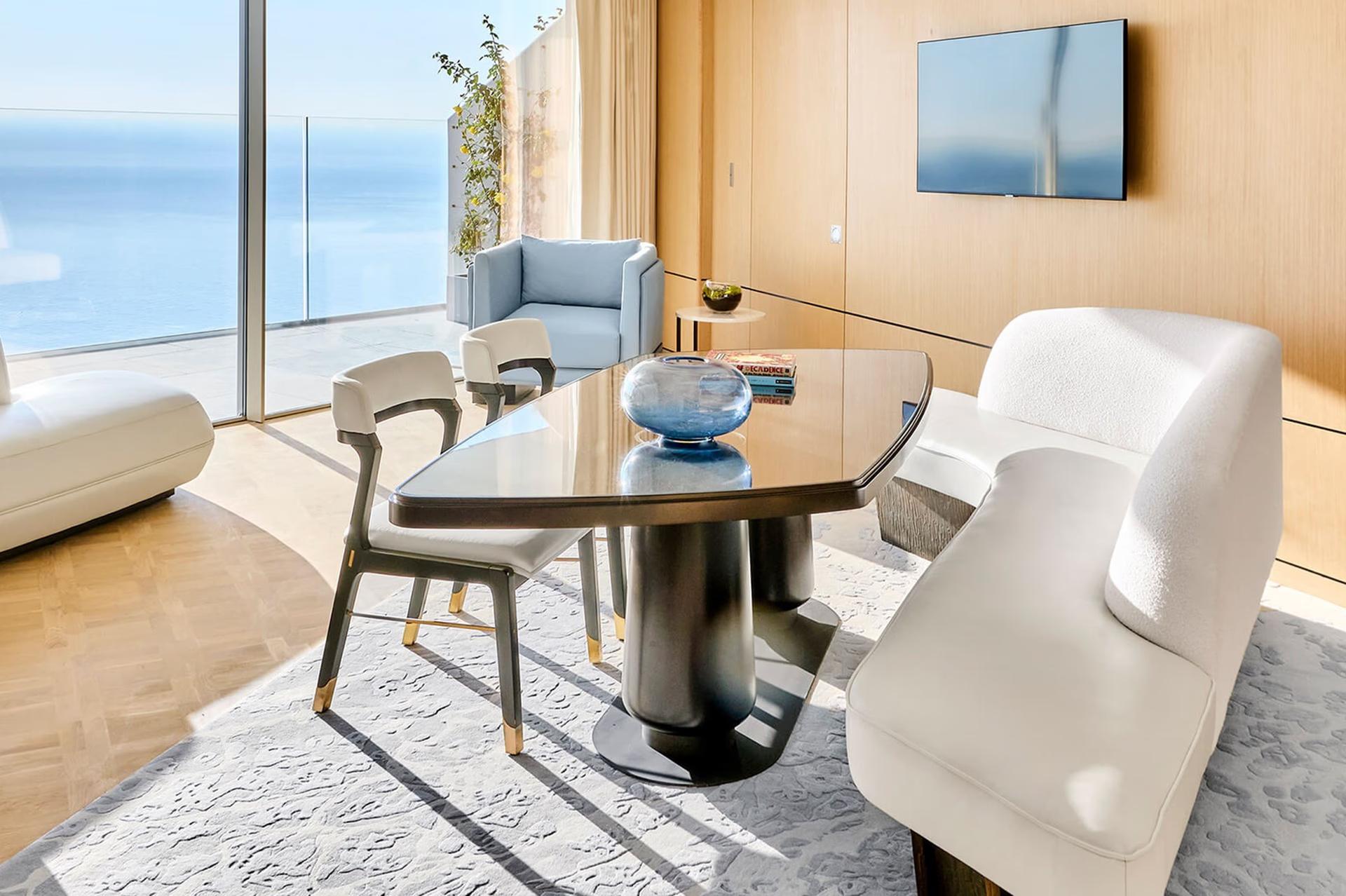 Maybourne Riviera: seating area with oceanfront views and contemporary furniture