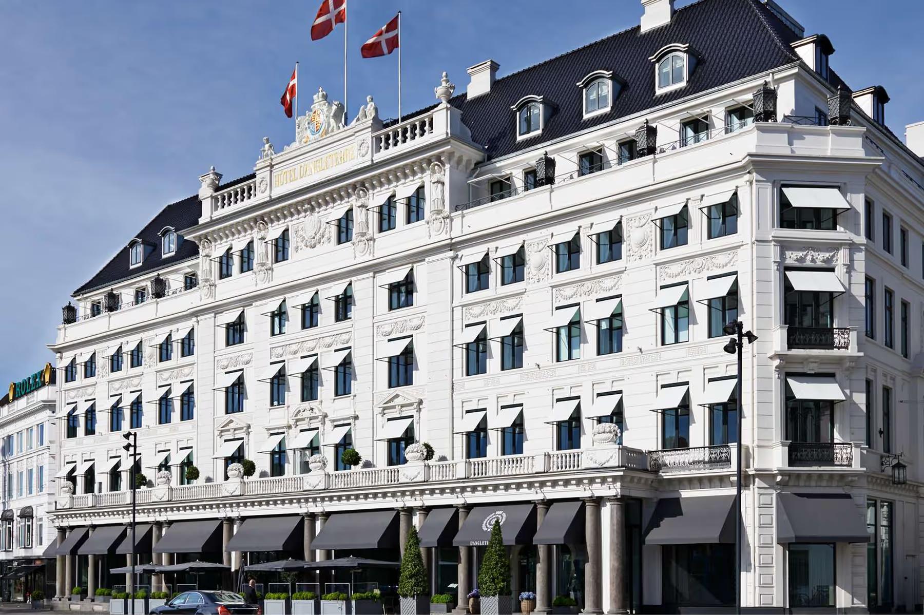 Hotel d’Angleterre: historic pale stone facade on Kongens Nytorv square with slate roofline
