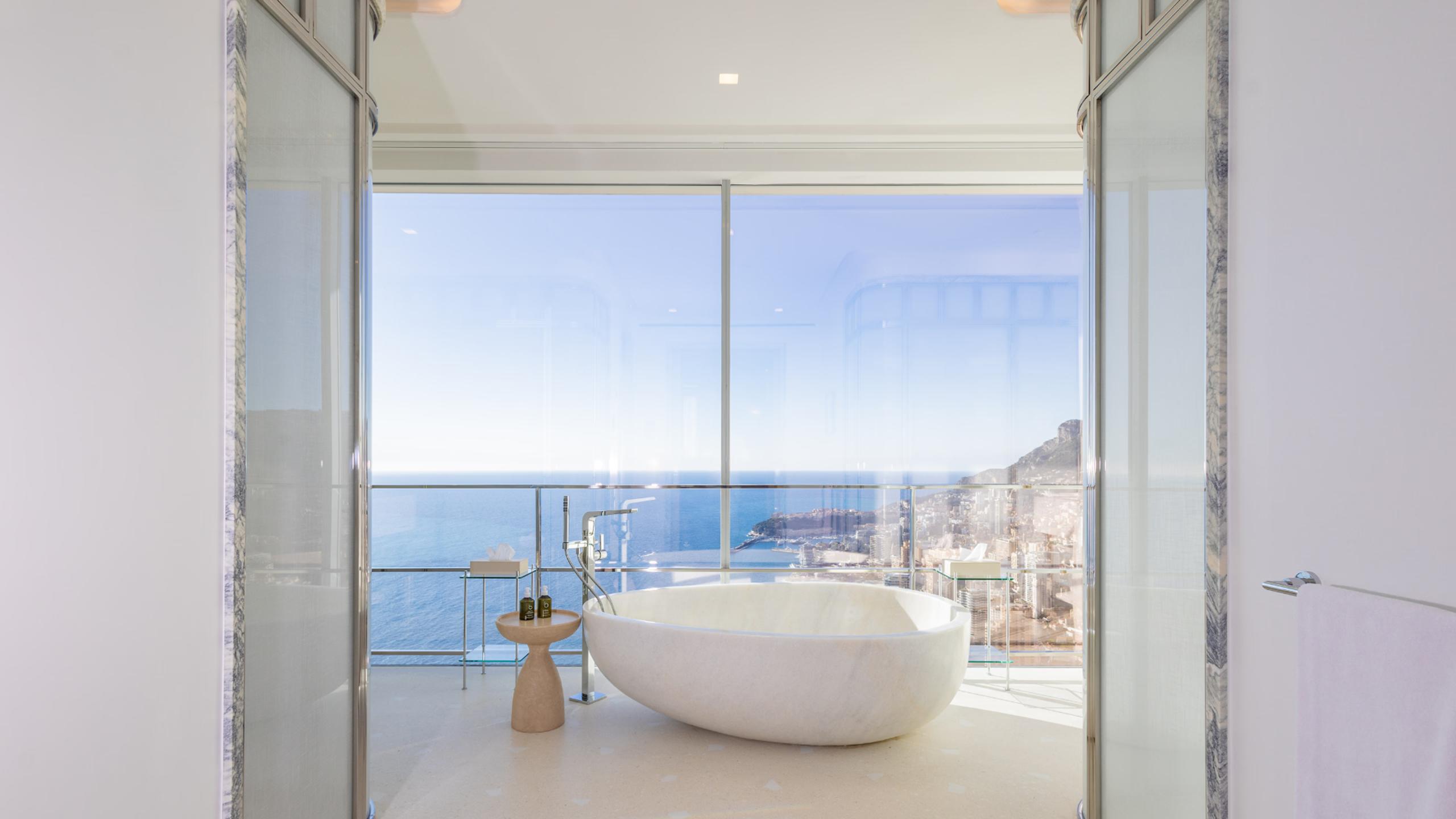 Maybourne Riviera: freestanding tub with sea views through floor-to-ceiling windows