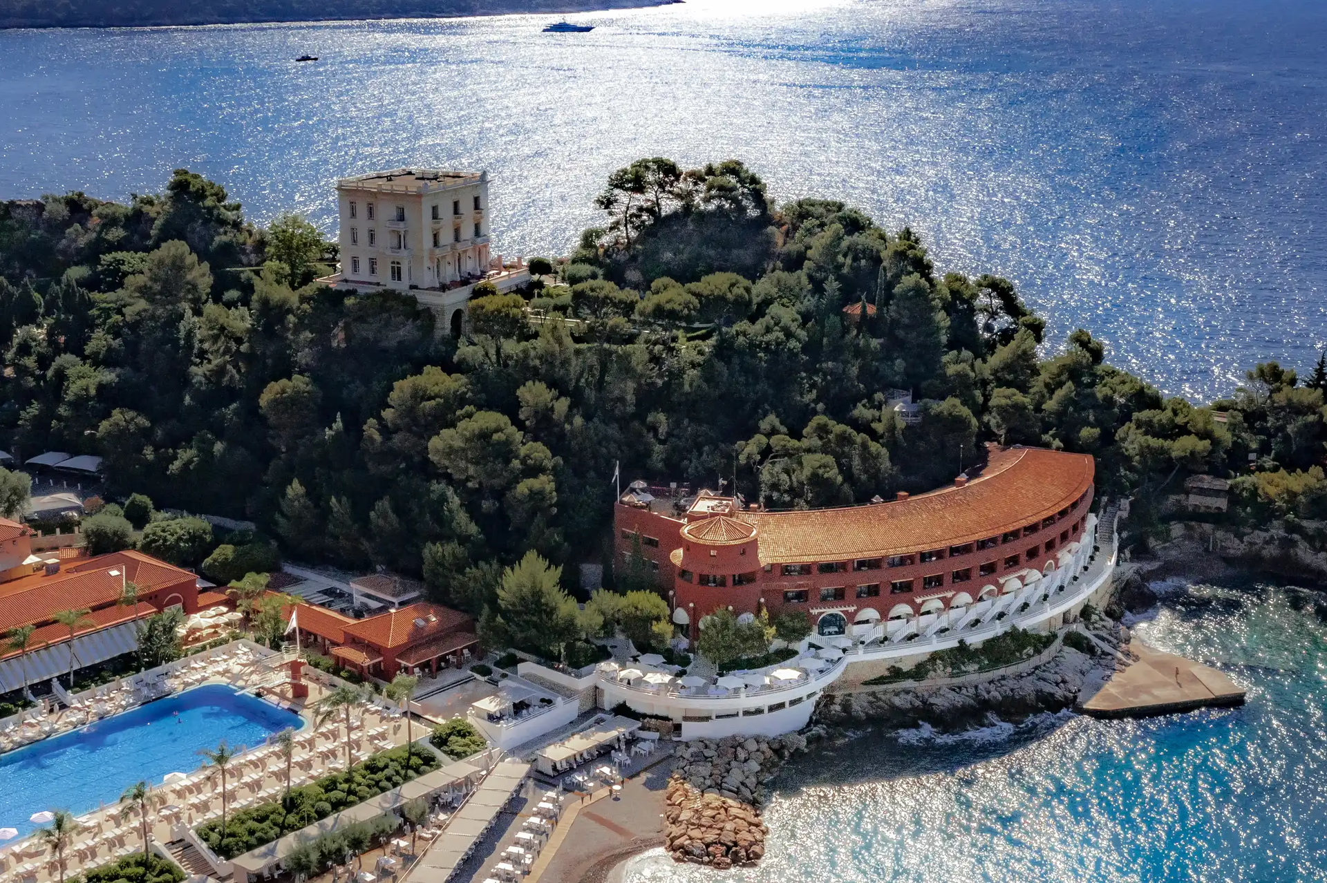 Hôtel de Paris Monte-Carlo: aerial view of beachfront property with pool, gardens, and Mediterranean beyond