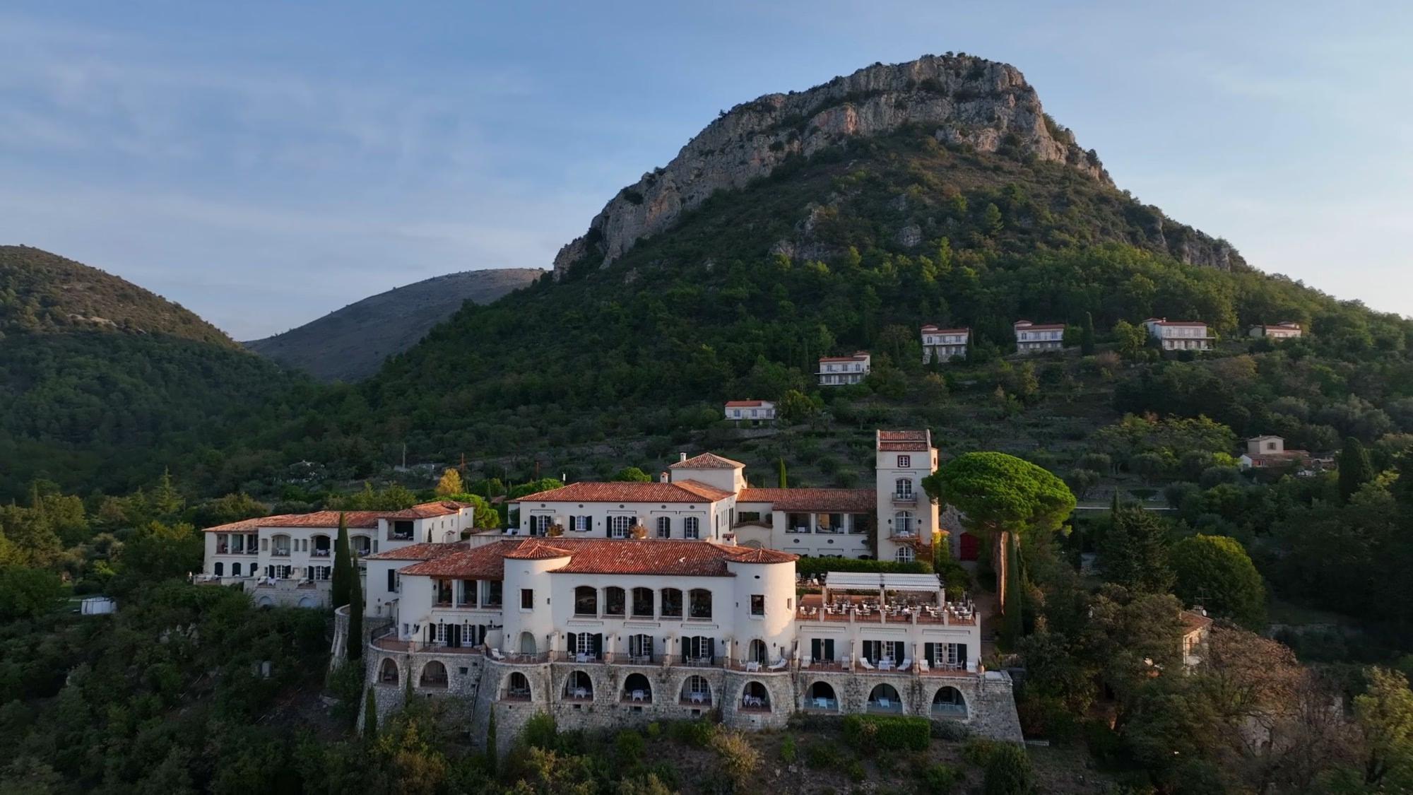 Château Saint Martin & Spa: hillside château with multi-story stone structures and terraced gardens