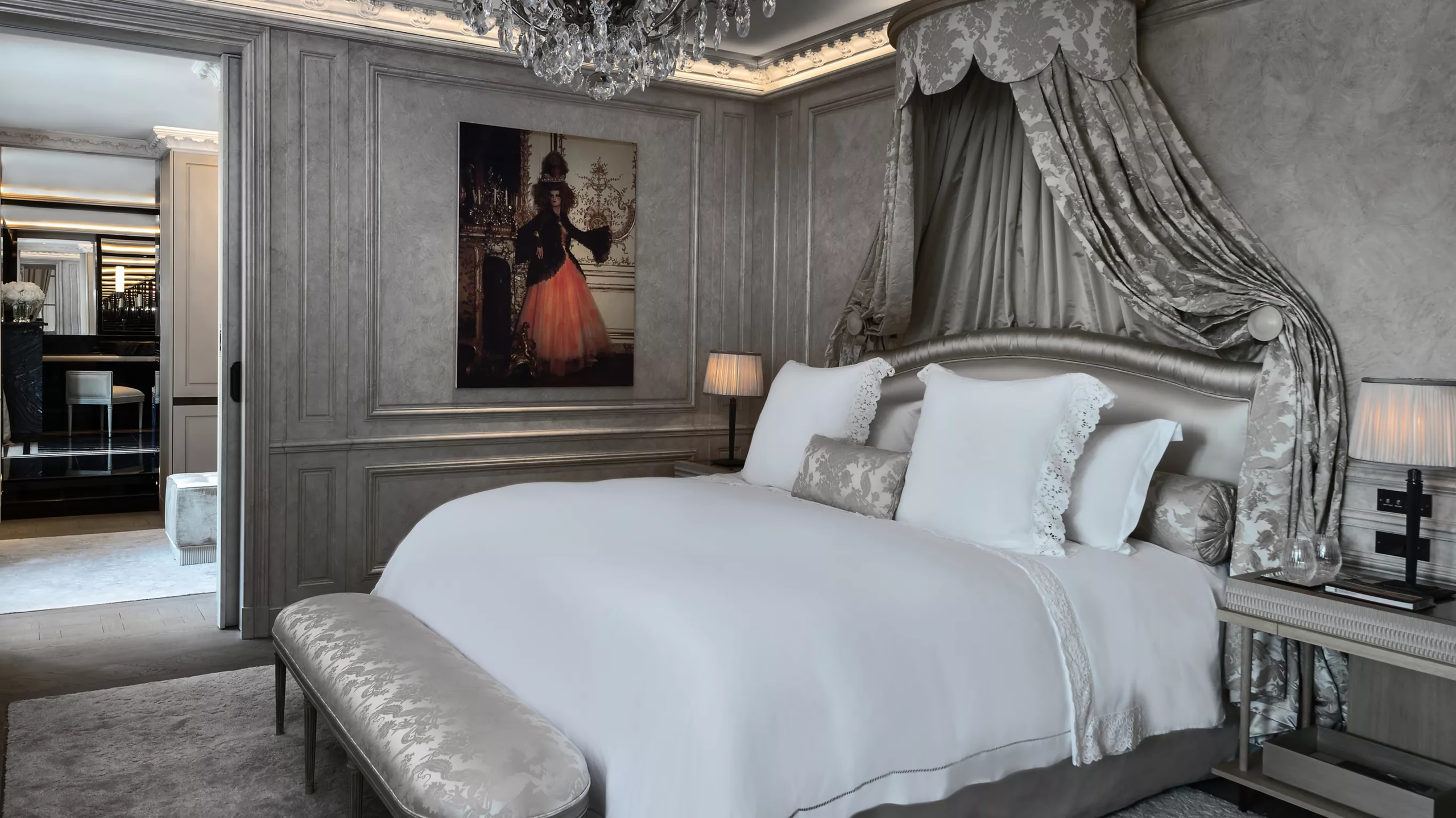 Grand suite with crystal chandelier, fireplace, and classical symmetrical layout
