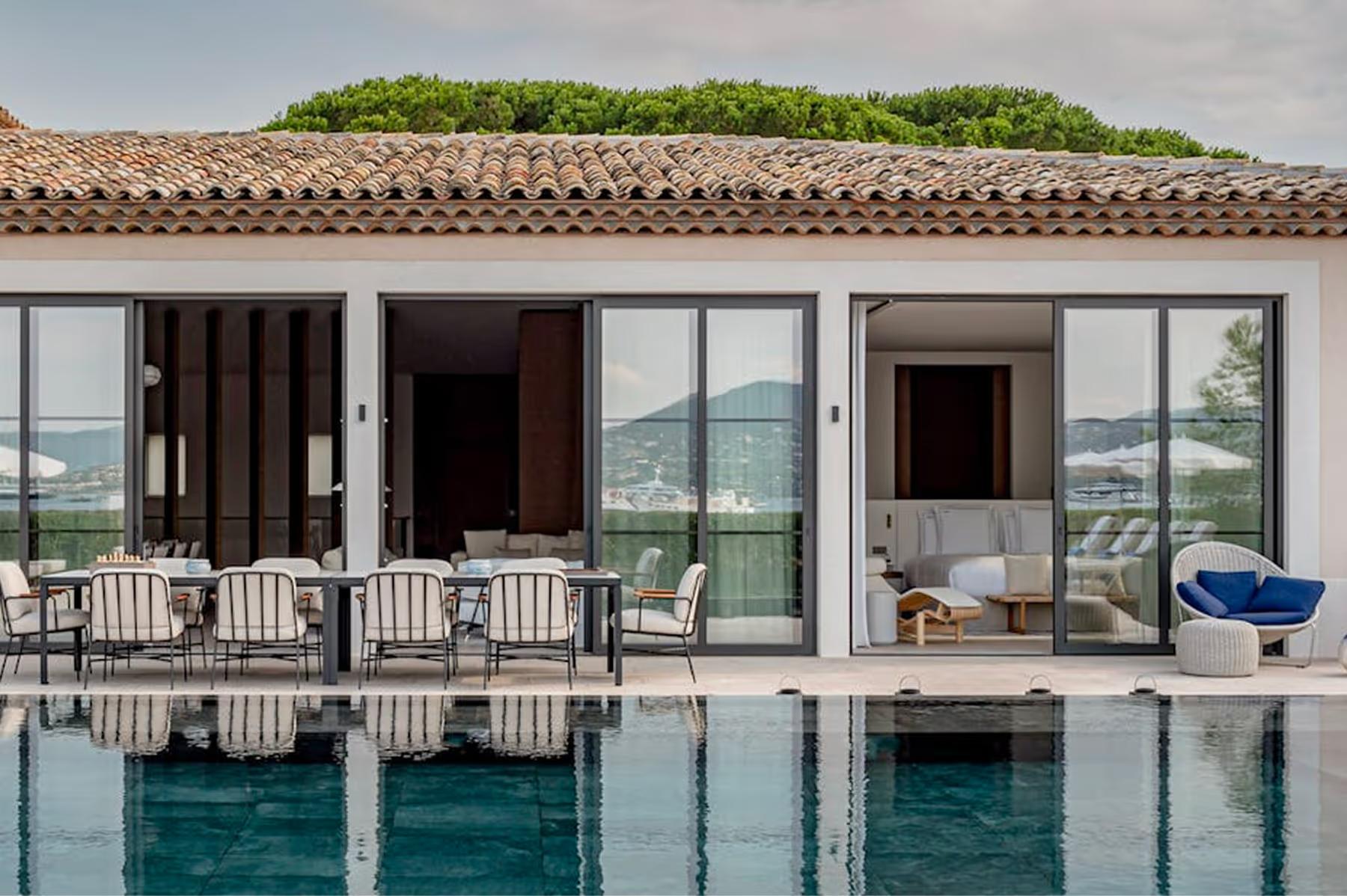 Cheval Blanc St-Tropez: villa exterior with green roof, infinity pool, and open terraces