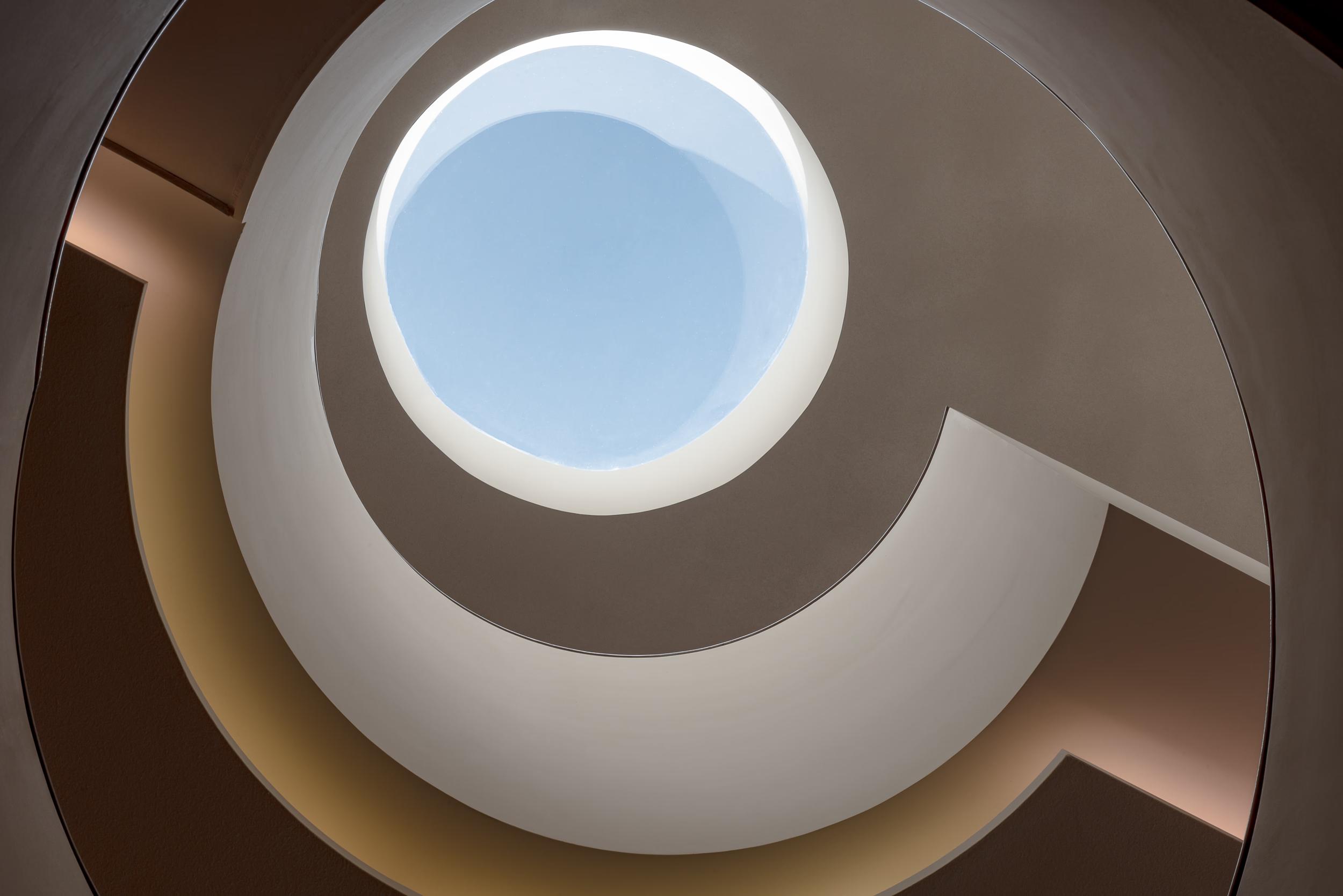 Royal Champagne Hotel & Spa: architectural spiral staircase viewed from above with circular skylight opening